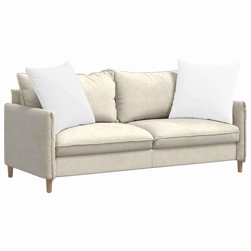 Ein beiges Zweisitzer-Sofa mit Holzbeinen, ausgestattet mit zwei großen weißen Kissen, vor einem leeren Hintergrund platziert.