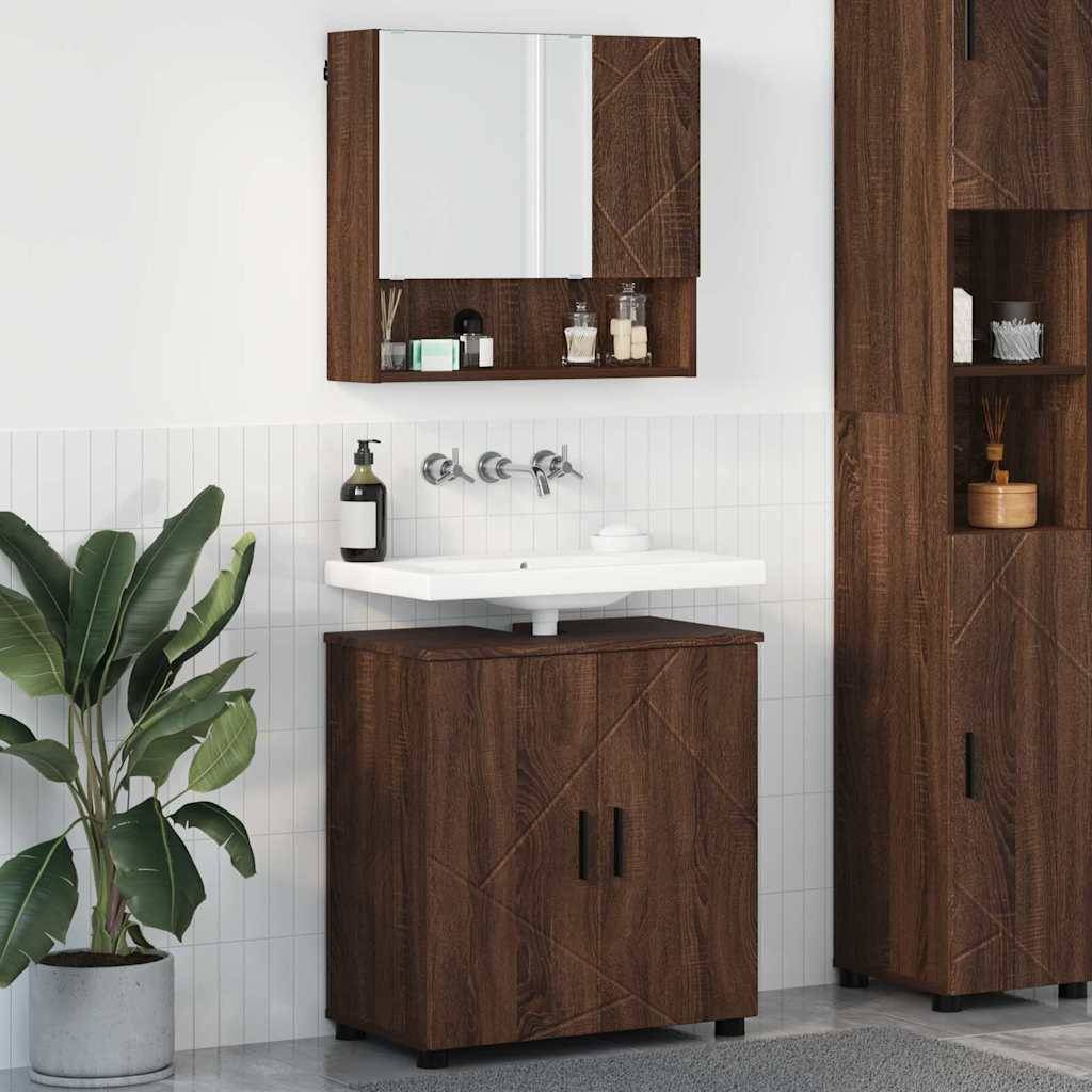 Badezimmereinrichtung mit einem Waschbecken und einem Holzunterschrank, einem Spiegelschrank darüber und einem hohen Regalsystem an der Seite. Eine Zimmerpflanze sorgt für eine grüne Note.