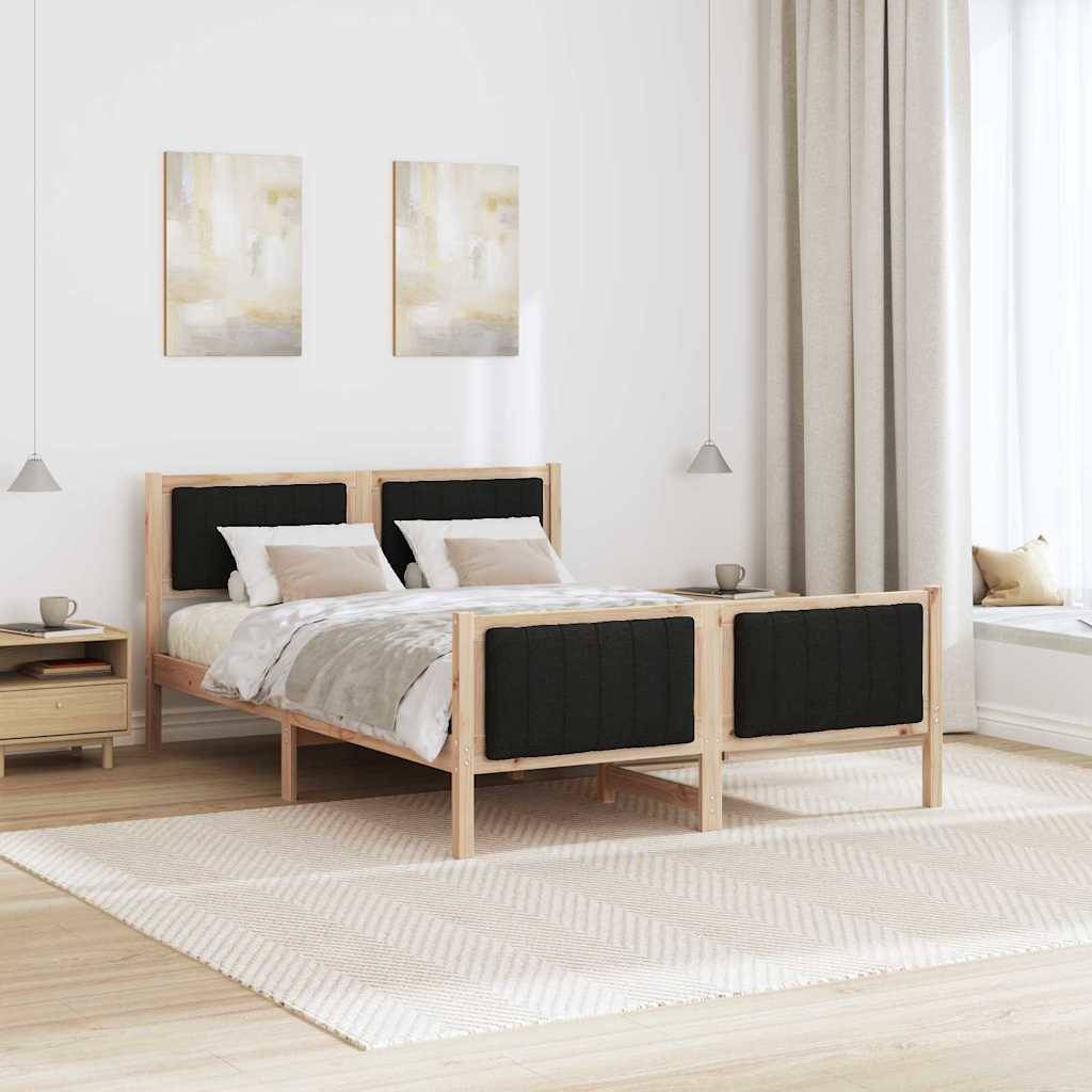 Ein minimalistisches Schlafzimmer mit einem Holzdoppelbett mit grauer Bettwäsche, zwei abstrakten Gemälden, einem Nachttisch und einer Fensterbank mit Kissen.