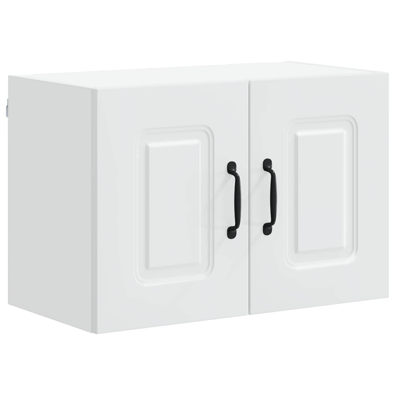 Ein weißer Wandschrank mit zwei Flügeltüren und schwarzen Griffen.
