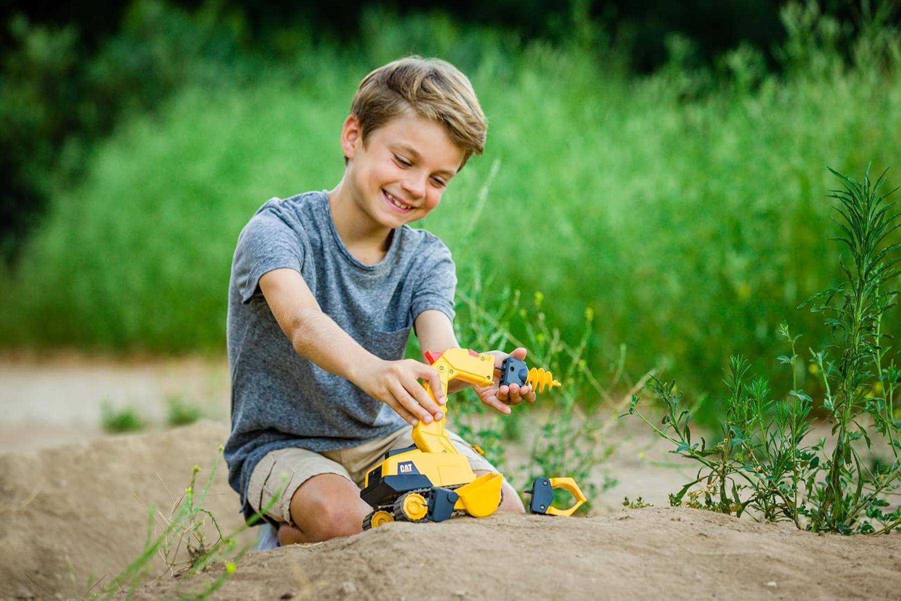 CAT Spielzeugbagger gelb mit Sound und Licht