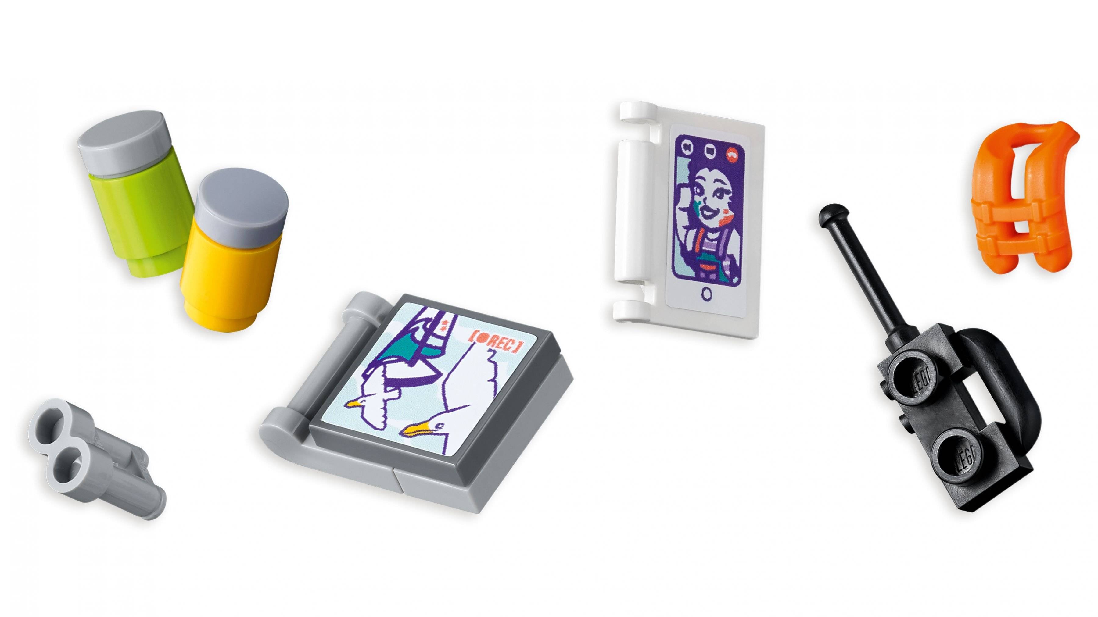 Lego-Teile, die wie ein digitales Zeichenpad, ein Smartphone mit einer Person auf dem Bildschirm und ein Stylus aussehen, deuten auf die Erstellung digitaler Kunst hin.