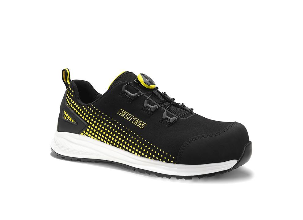 Schwarzer und gelber Sneaker mit 'Elten' Logo, ausgestattet mit einer dicken weißen Sohle und gelben Akzenten an den Seiten und Schnürsenkeln.