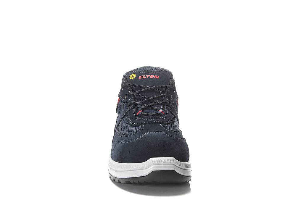 Ein dunkelblauer Sicherheitsschuh mit schwarzen Schnürsenkeln, versehen mit einem gelben dreieckigen Sicherheitsbewertungsabzeichen, von vorne betrachtet mit einer weißen Sohle.