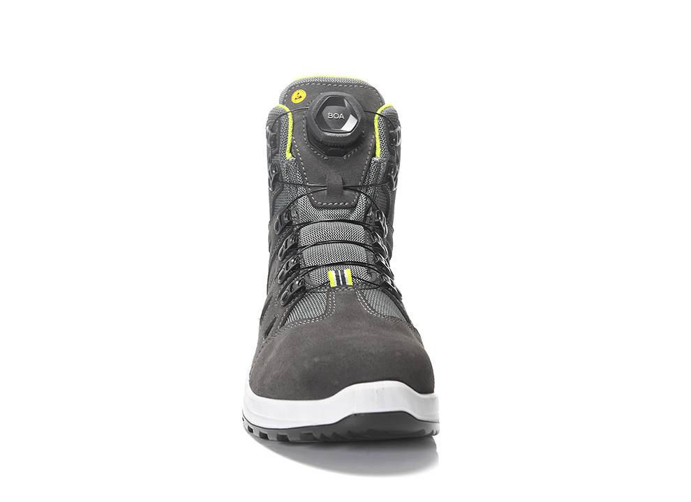 Ein robuster, dunkelgrauer Stiefel mit Boa-Schnürsystem, ausgestattet mit einer weißen Sohle und limegrünen Akzenten. Als Produktbild präsentiert.