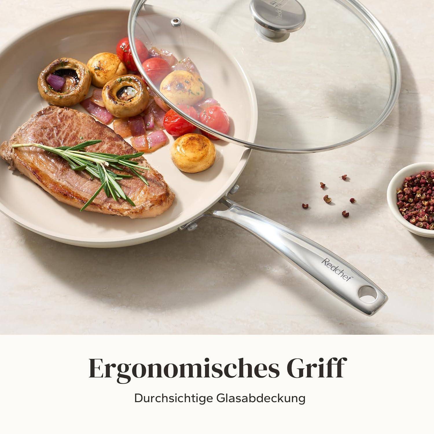 Eine Bratpfanne mit Steak, Pilzen, Tomaten und Zwiebeln, bedeckt von einem Glasdeckel. Darunter stehen die Worte 'Ergonomischer Griff' und 'Durchsichtige Glasabdeckung.