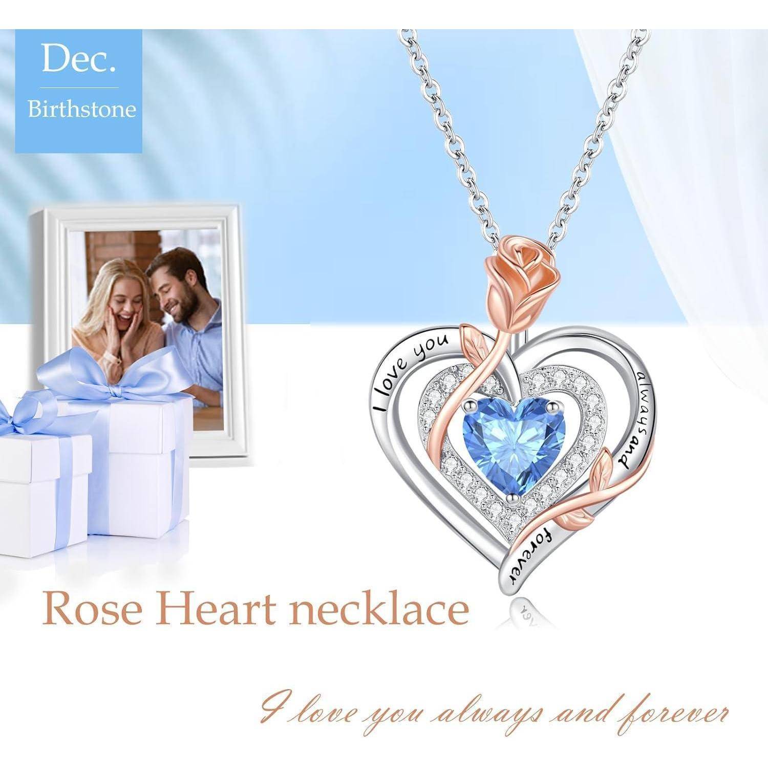 Rosenherz-Halskette mit blauem Dezember-Geburtsstein, eingraviert mit 'Ich liebe dich immer und für immer'. Nahaufnahme eines Paares, Geschenkbox.