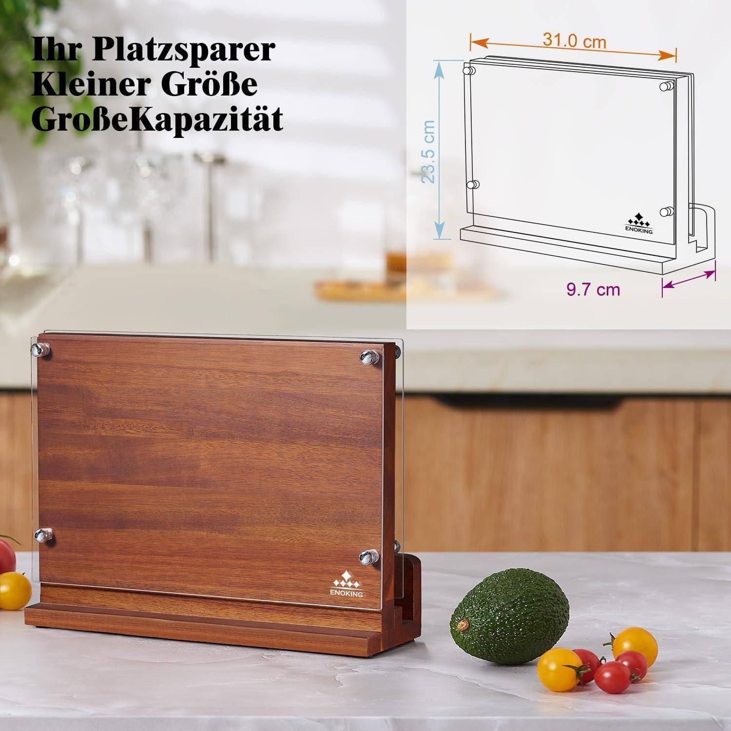 Ein Holzschneidebrett mit Ständer, mit beschrifteten Abmessungen: 31 cm breit, 9,7 cm tief, 26,5 cm hoch. Früchte sind daneben platziert.