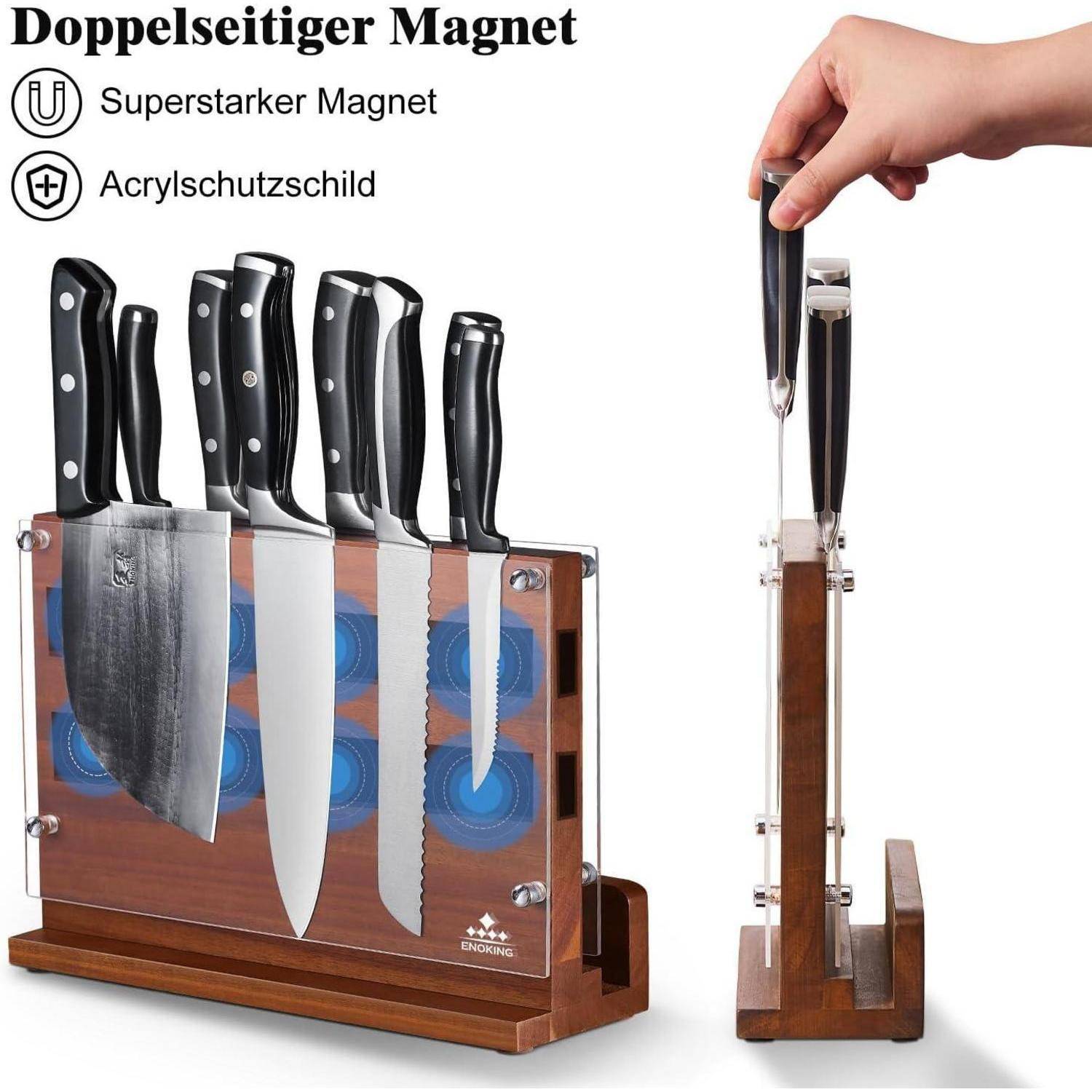 Ein beidseitiger magnetischer Messerhalter mit mehreren Küchenmessern, die in den Magnethalter eingesetzt sind, wobei die magnetische Funktion und der Acrylschutz sichtbar sind. Eine Hand platziert ein Messer.