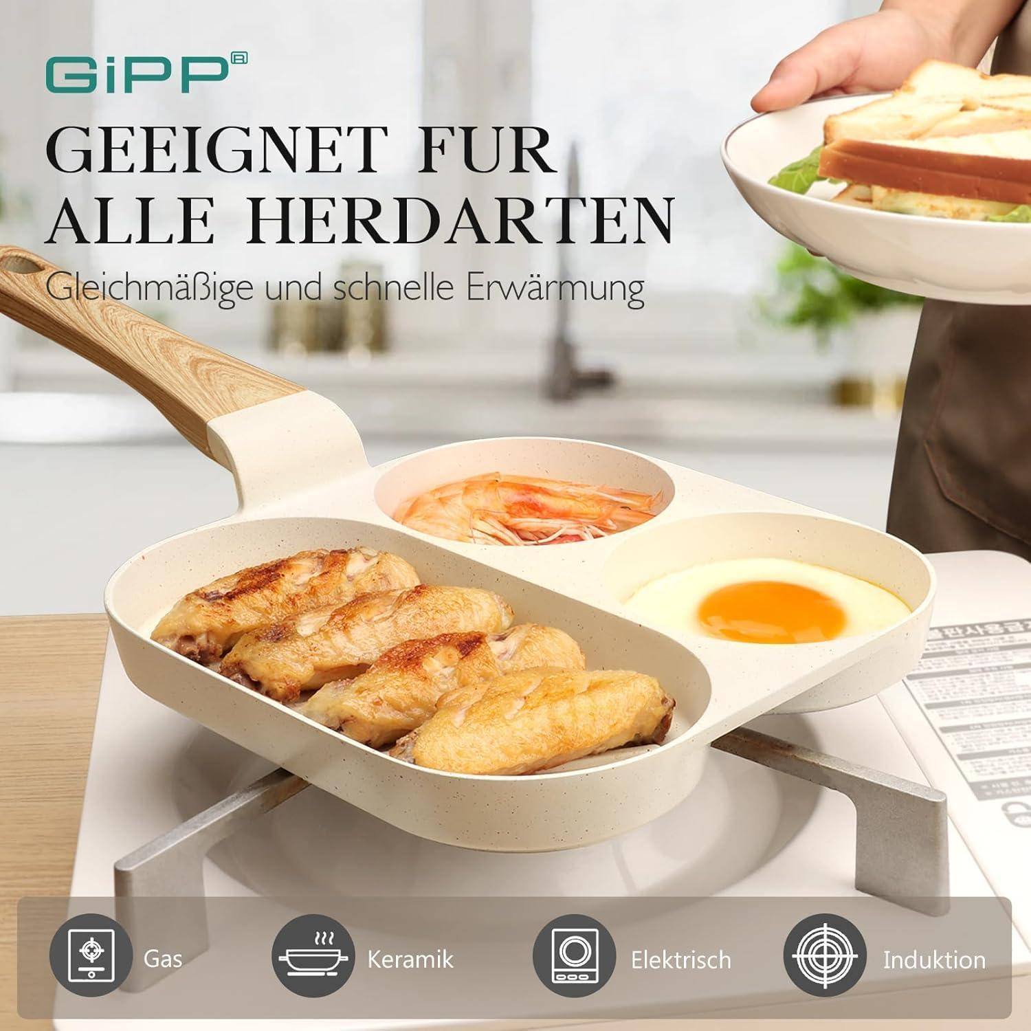 Eine Pfanne auf einer Küchenarbeitsplatte mit einem Spiegelei und Fischfilets, die eine 