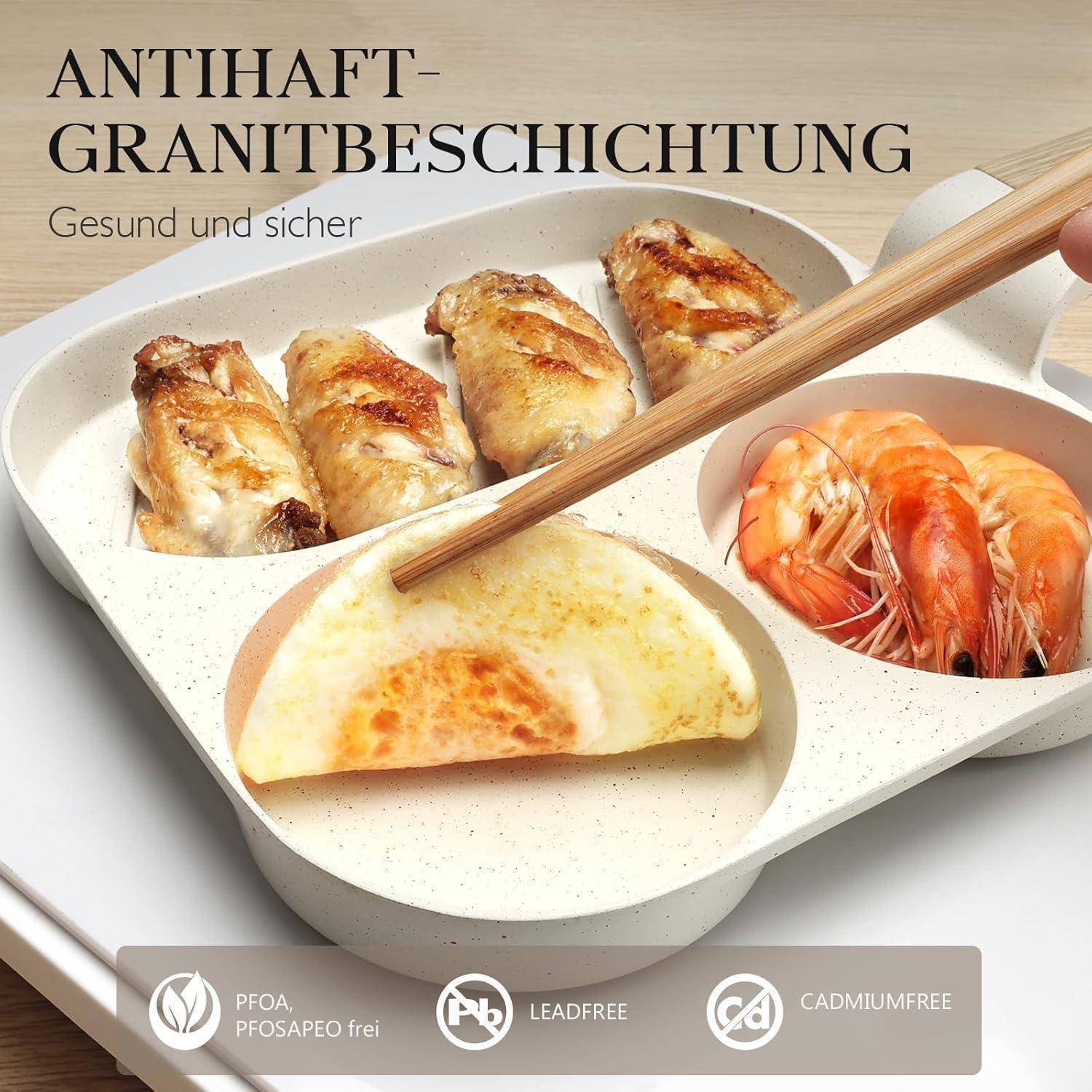 Antihaftpfanne mit Granitbeschichtung mit Meeres- und Hühnchenstücken; Etiketten weisen darauf hin, dass sie gesund ist, PFOA- und cadmiumfrei.