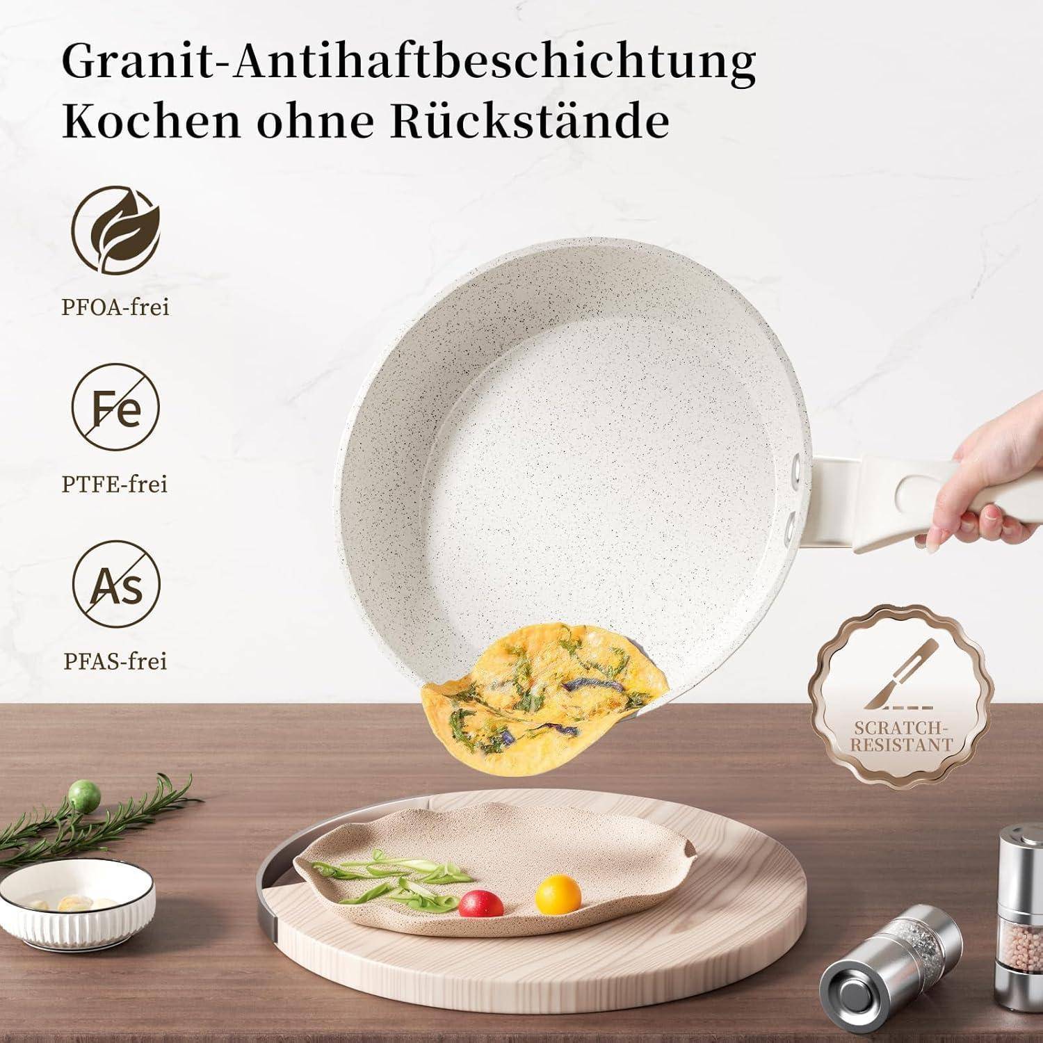Eine Hand hält eine weiße Antihaft-Pfanne mit einem Omelette. Text lautet: 'Granit-Antihaftbeschichtung, Kochen ohne Rückstände, PFOA-frei, PTFE-frei, PFAS-frei'.