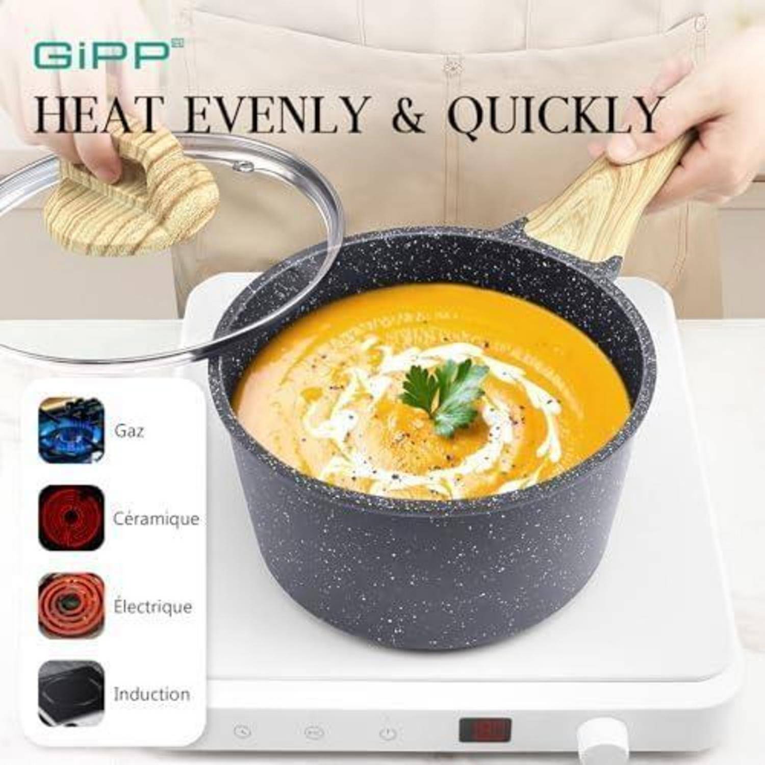 Eine Person, die einen Holzdeckel über einen Topf mit orangefarbener Suppe auf einem Induktionsherd hält; Text lautet 