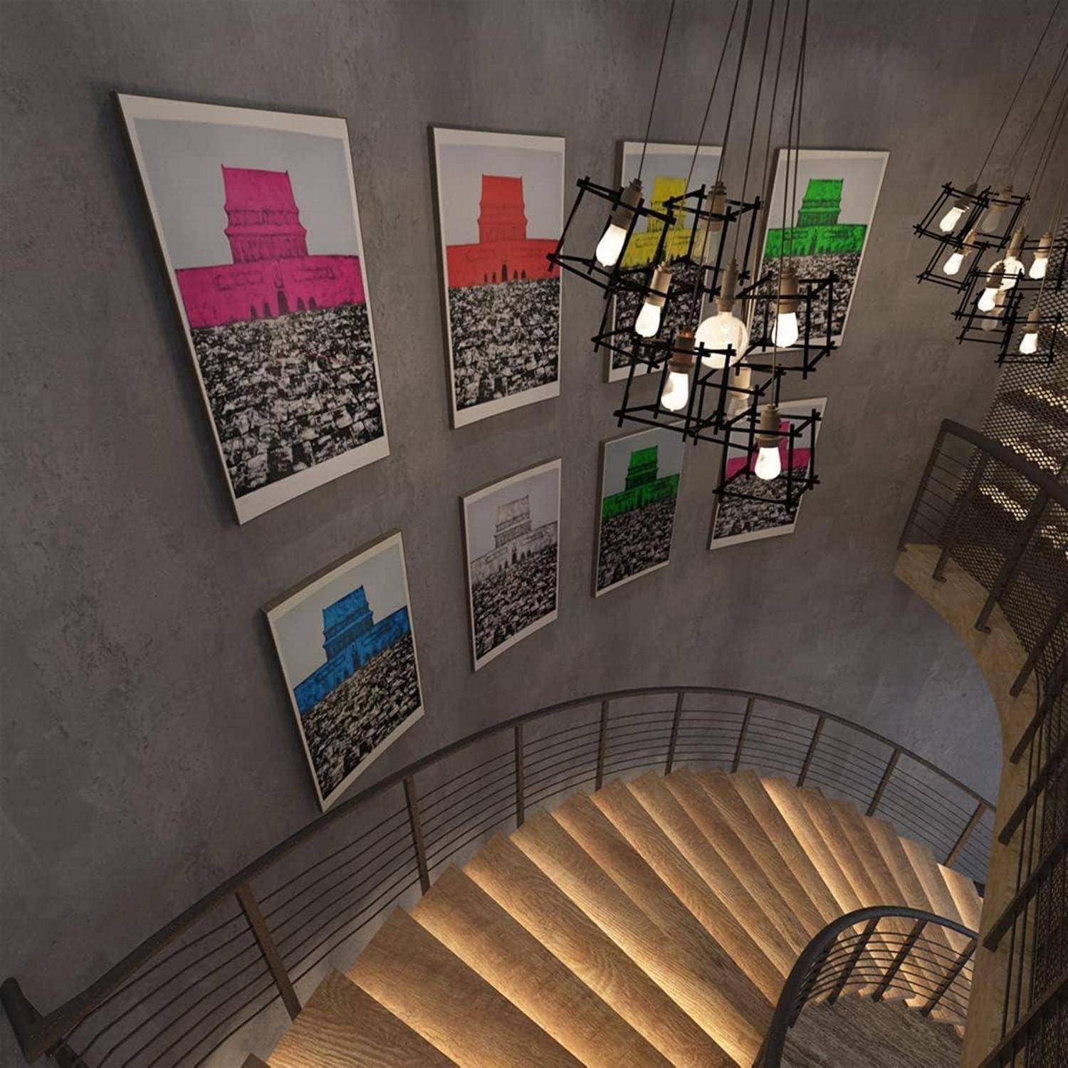 Eine Wendeltreppe mit leuchtenden Stufen ist von Kunstwerken umgeben, die lebendige Farben vor monochromen Hintergründen an den Wänden zeigen.