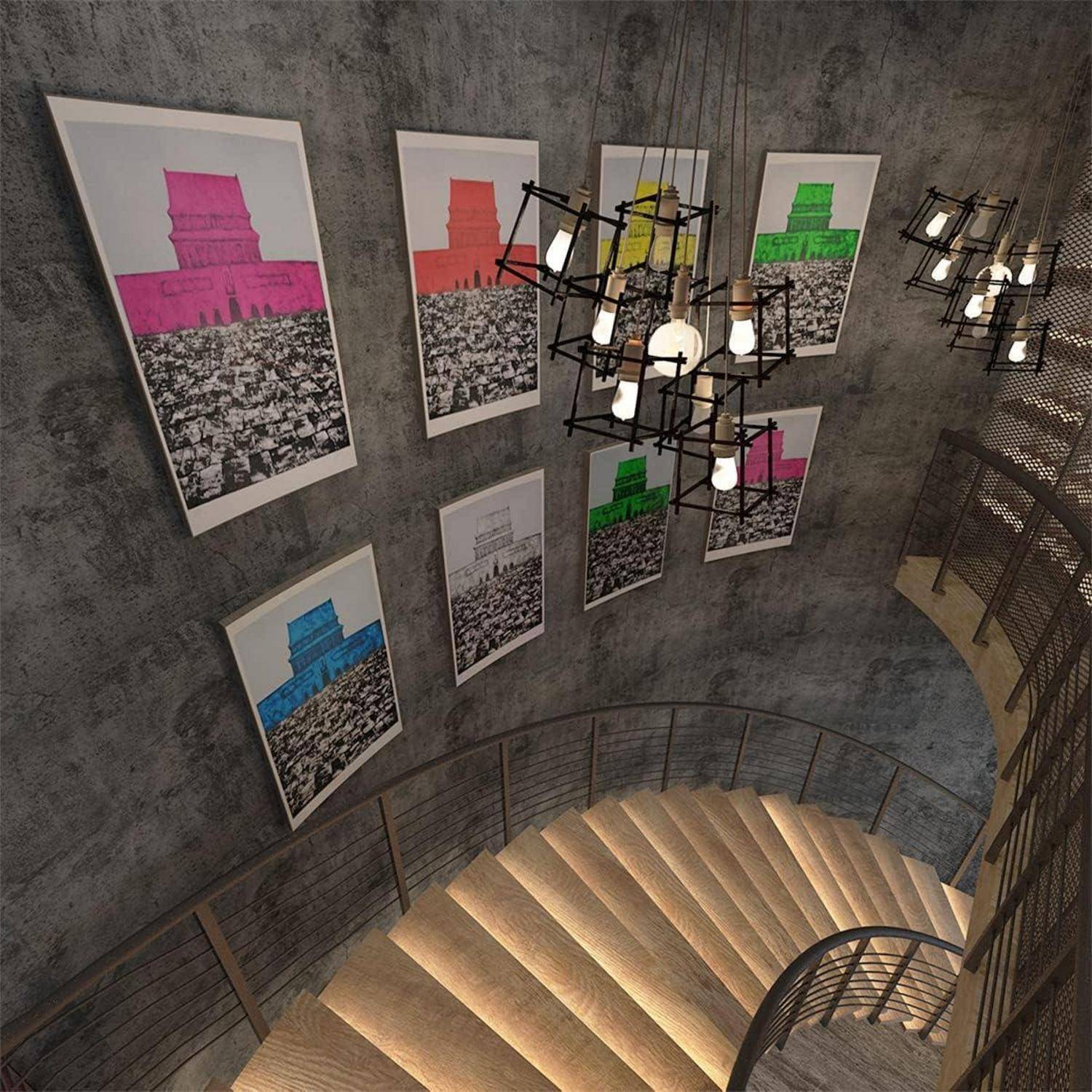 Eine Wendeltreppe mit moderner Beleuchtung führt an einer Betonwand vorbei, an der große, farbenfrohe Stadtlandschaftskunstdrucke in Rosa, Gelb, Blau und Grün ausgestellt sind.