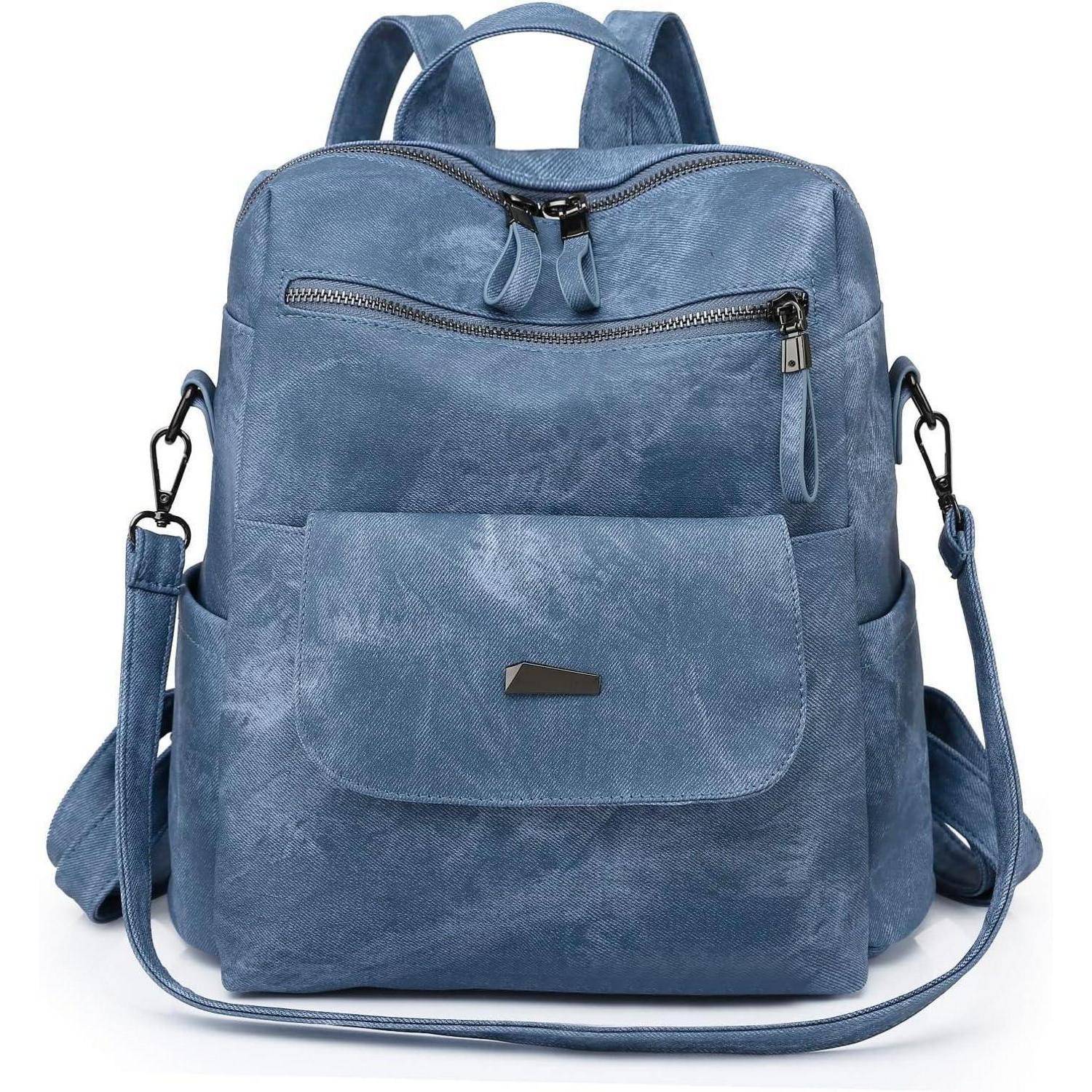 Ein stilvoller blauer Rucksack mit mehreren Taschen und verstellbaren Trägern. Die Vordertasche verfügt über einen dekorativen Metalleinsatz.