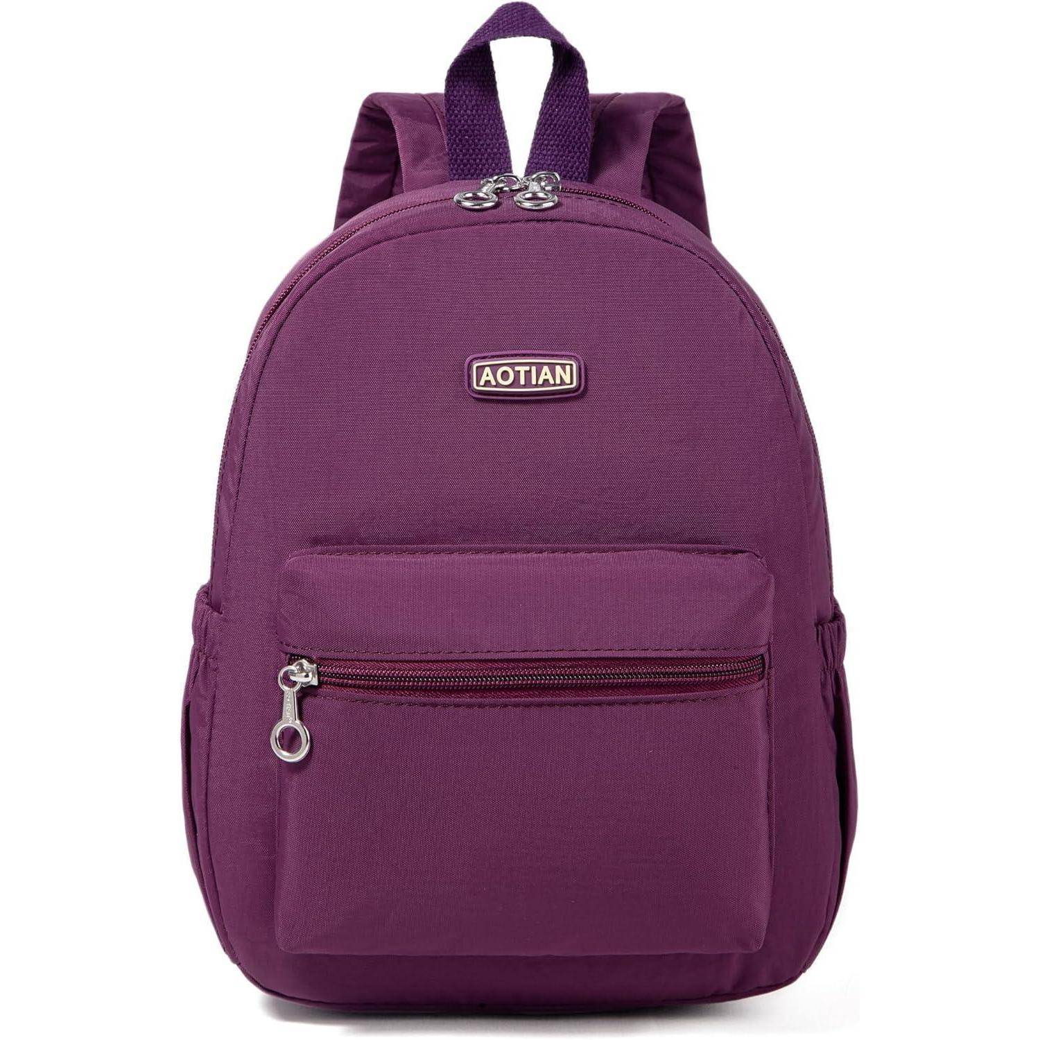 Ein lila Rucksack mit einer Reißverschlusstasche vorne und Tragegriff oben. Der Markenname 'AOTIAN' ist auf einem Etikett in der Mitte oben sichtbar.