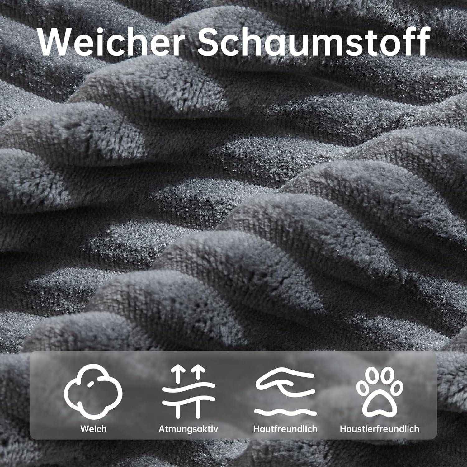 Weiches graues Schaumstoff mit einer gedrehten Textur. Die Symbole darunter zeigen, dass das Material weich, atmungsaktiv, hautfreundlich und haustierfreundlich ist.