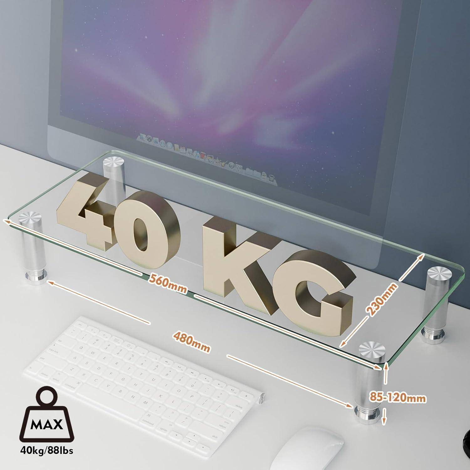 Glasmonitorständer mit Metallbeinen, unterstützt bis zu 40 kg. Abmessungen: 560 mm breit, 230 mm tief und in der Höhe verstellbar von 85-120 mm.