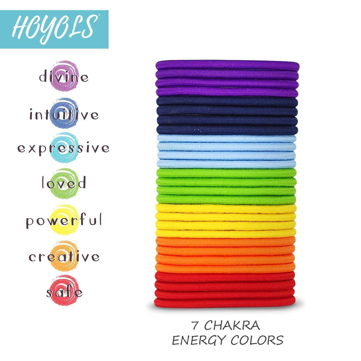 HOYOLS' Haargummis in 7 Farben: Lila, Indigo, Blau, Grün, Gelb, Orange, Rot, die verschiedene Energiechakren und Emotionen repräsentieren.