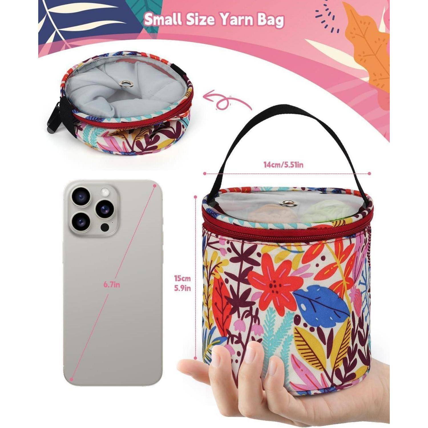 Kleine Garnbeutel' mit farbenfrohem Blumenmuster, misst 14 cm im Durchmesser und 15 cm in der Höhe, wird neben einem Smartphone zur Größeneinschätzung gezeigt.