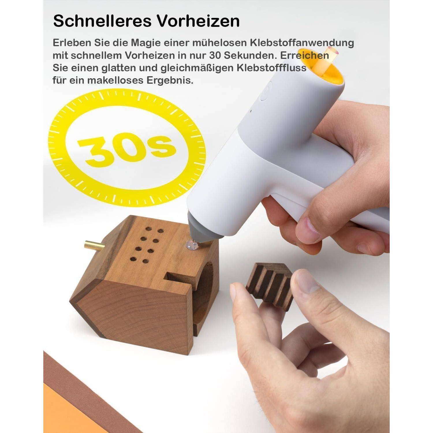 Eine Person verwendet eine Heißklebepistole auf einem Holzobjekt mit einer Texteinblendung auf Deutsch über schnelleres Vorheizen in 30 Sekunden.