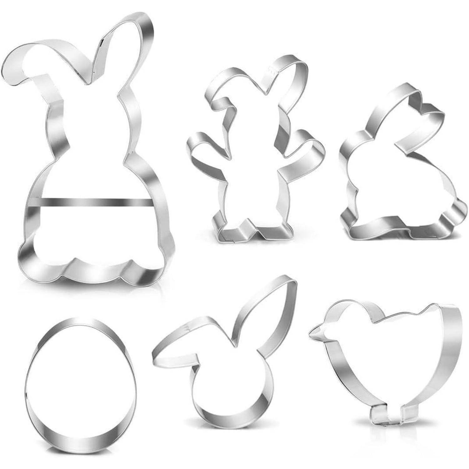 Metallene Ausstechformen in Gestalt eines Hasen, eines Eis, eines Kükens und eines Kaninchens. Perfekt für thematische Back- und Dekorationsaktivitäten.