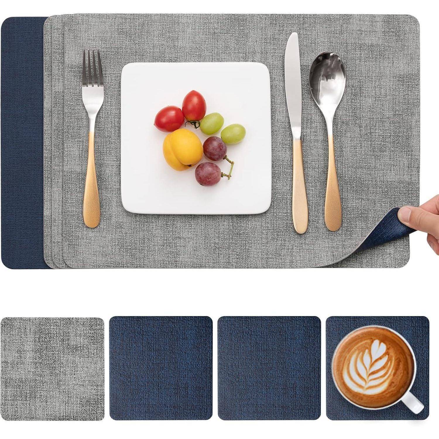 Gedeck mit einer Gabel, einem Messer, einem Löffel und einem kleinen Teller mit Früchten auf grau-marineblau-Tischsets. Zusätzliche Tischsets sind unten zu sehen.