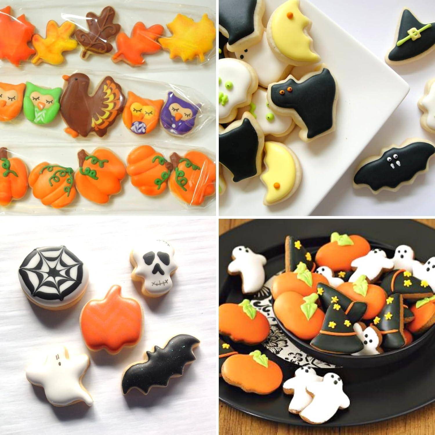 Eine Auswahl an Halloween-Plätzchen mit Kürbissen, Geistern, Fledermäusen, Hexenhüten und Herbstblättern, die mit bunter Zuckerguss verziert sind.