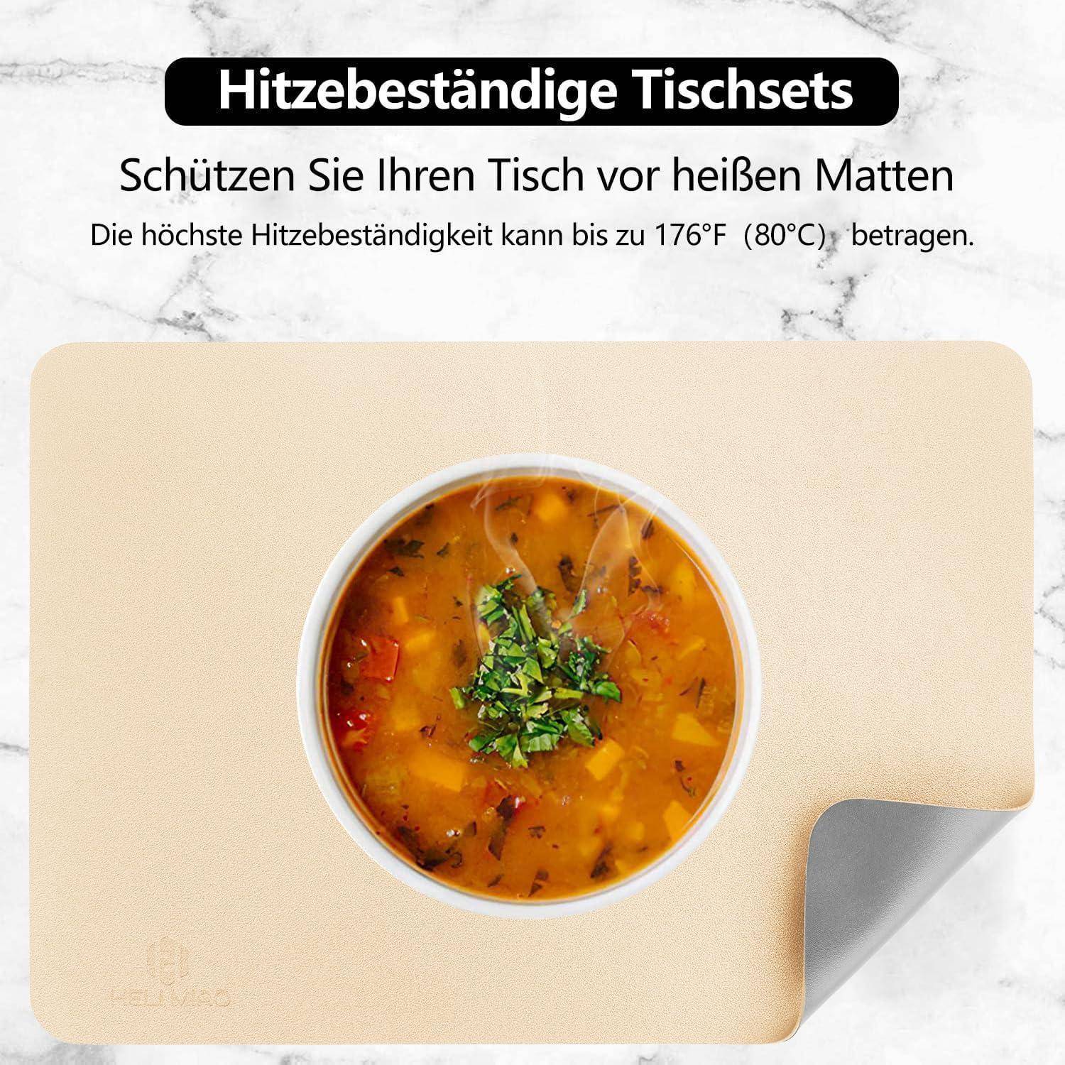 Eine Schüssel Suppe auf einem hitzebeständigen Tischset. Text auf Deutsch erklärt, dass das Set Oberflächen vor Hitze bis zu 176°F (80°C) schützt.
