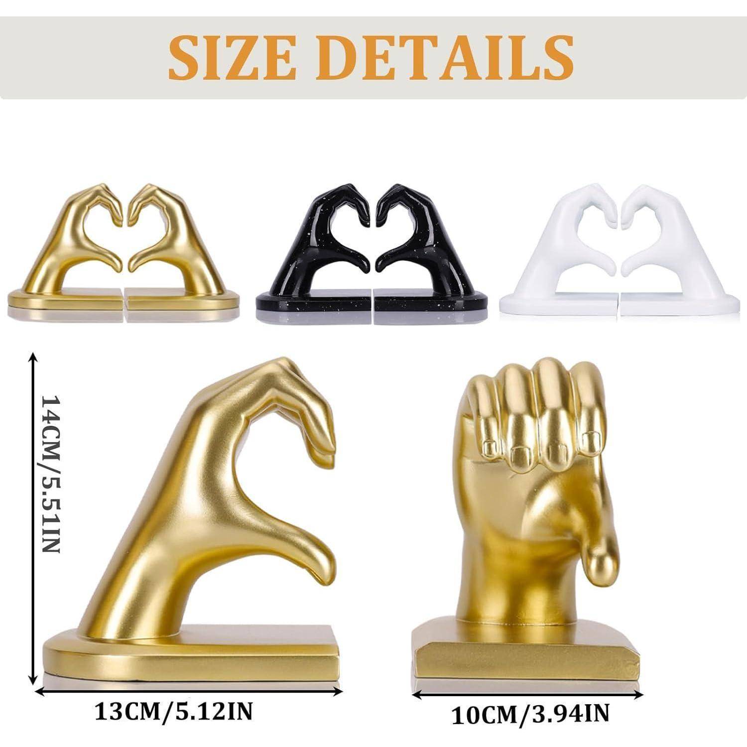 Größenangaben' über skulptierten Buchstützen in verschiedenen Posen und drei Ausführungen: gold, schwarz, weiß. Abmessungen: 14 cm x 13 cm und 10 cm.