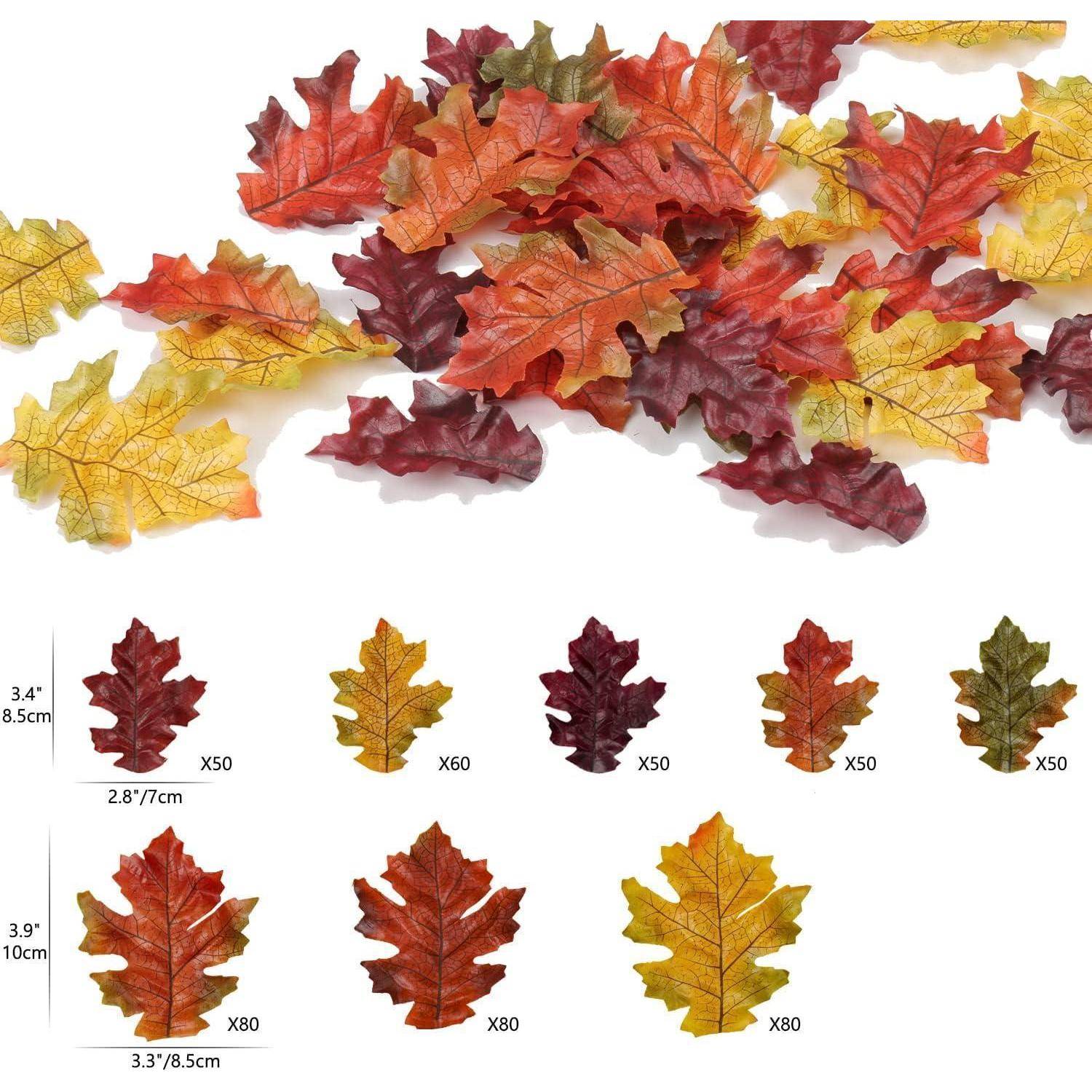 Künstliche Herbstblätter in verschiedenen Farben und Größen, mit Etiketten, die Mengen und Abmessungen angeben: X50, X60, X80, in cm/Zoll.