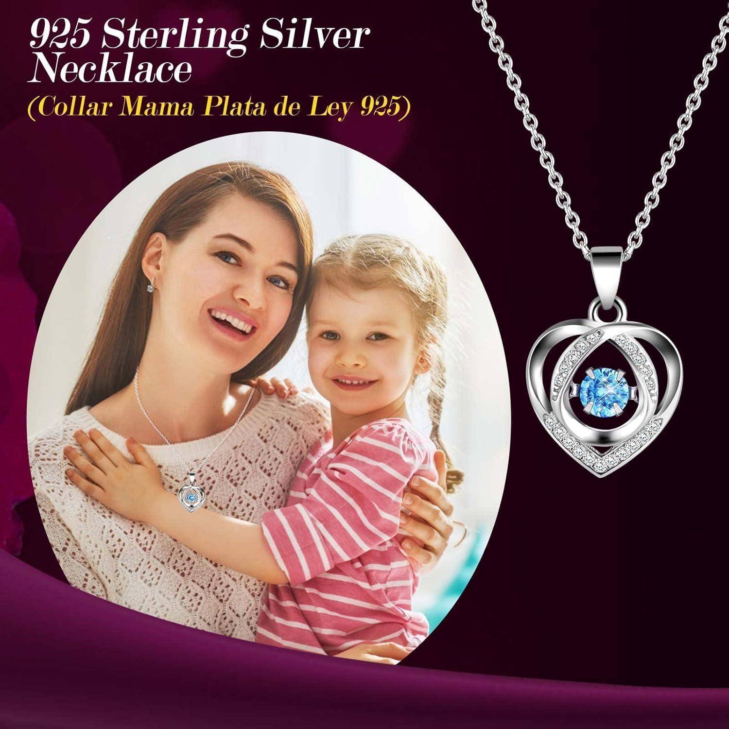 Eine Frau und ein Kind lächeln, beide tragen Halsketten. Text: '925 Sterlingsilber Halskette (Collar Mama Plata de Ley 925)'. Silberner Herzanhänger mit blauem Edelstein gezeigt.