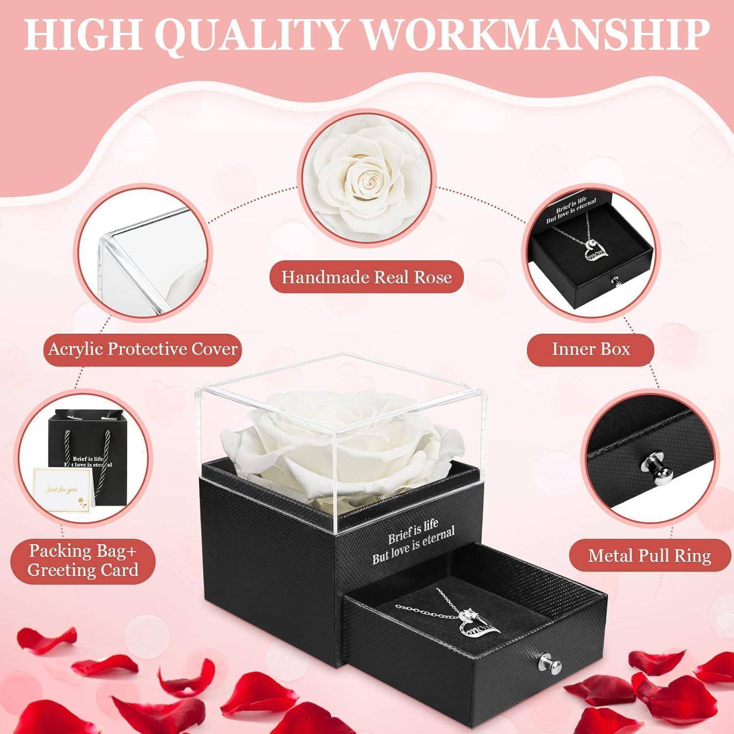 Geschenkbox mit 'Hochwertiger Handwerkskunst' enthält eine echte konservierte Rose unter einer Acrylhaube mit einer Schublade, in der eine Halskette aufbewahrt wird.