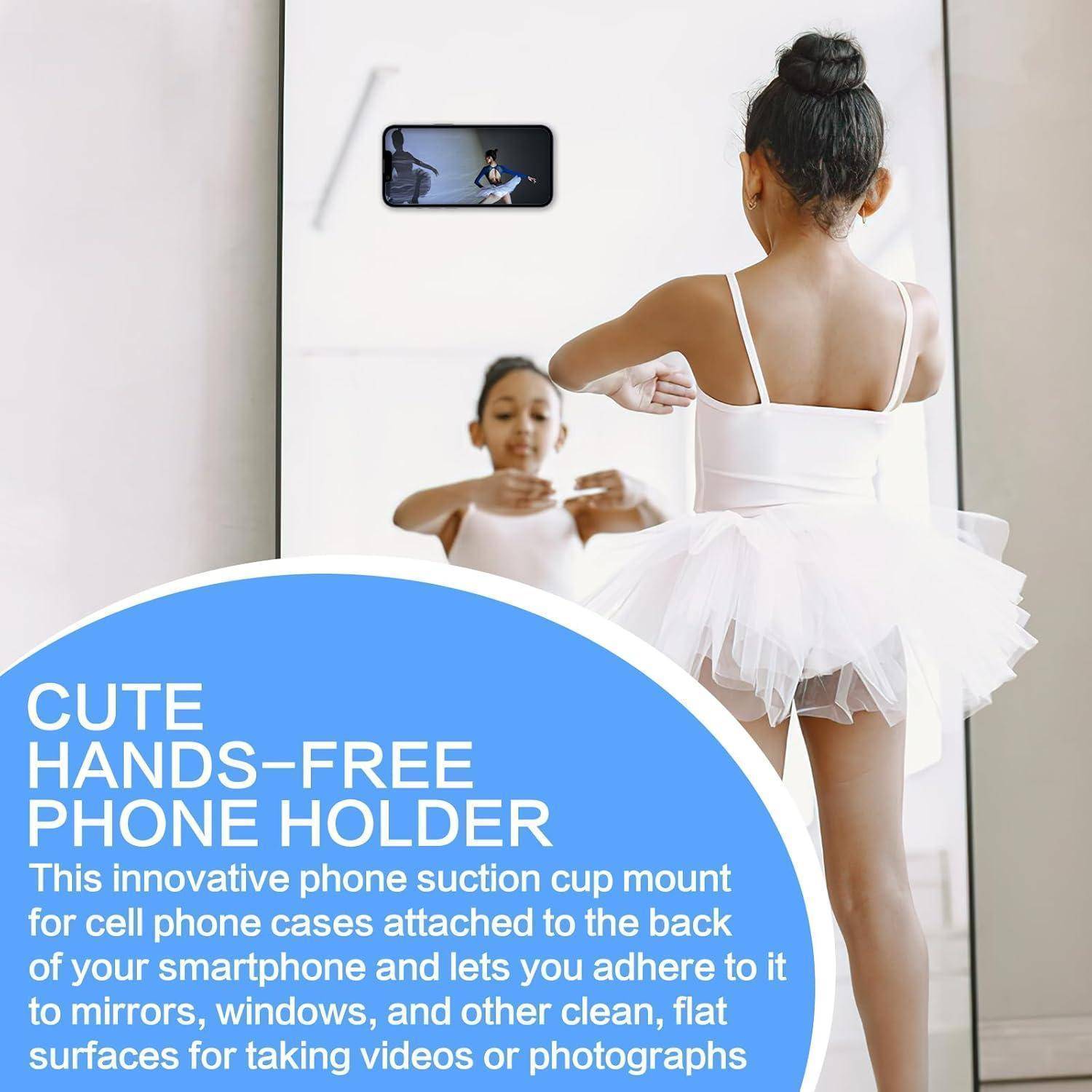 Ein Kind in einem Tutu betrachtet ein Telefon, das mit einem Saugnapfhalter an einer Wand befestigt ist; der Text beschreibt das Produkt als einen Telefonhalter für freihändige Nutzung.