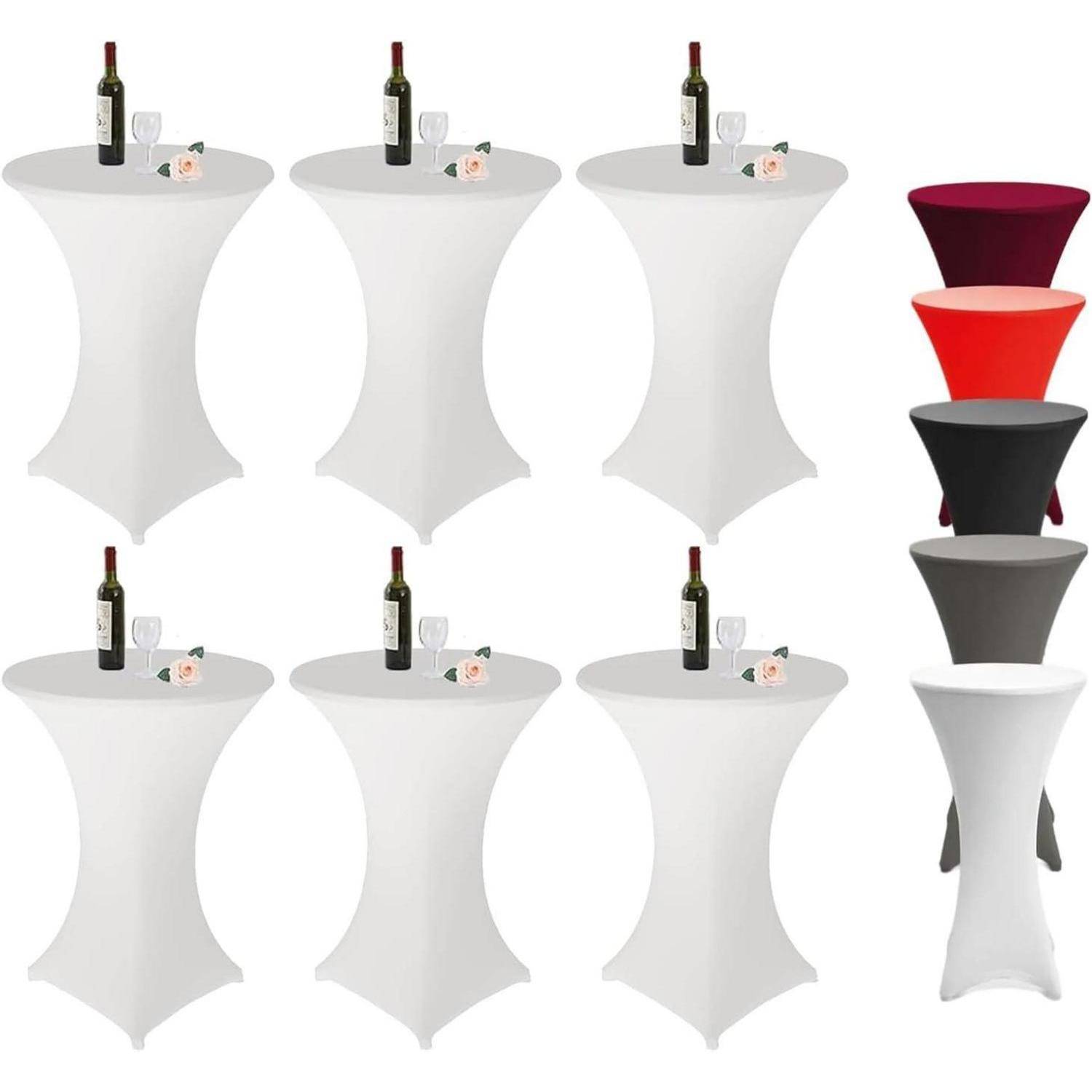 Runde Cocktailtische mit weißen, passgenau bezogenen Tischdecken, jeweils bestückt mit einer Weinflasche und zwei Gläsern; zusätzlich ausgestellte Tischdecken in verschiedenen Farben.