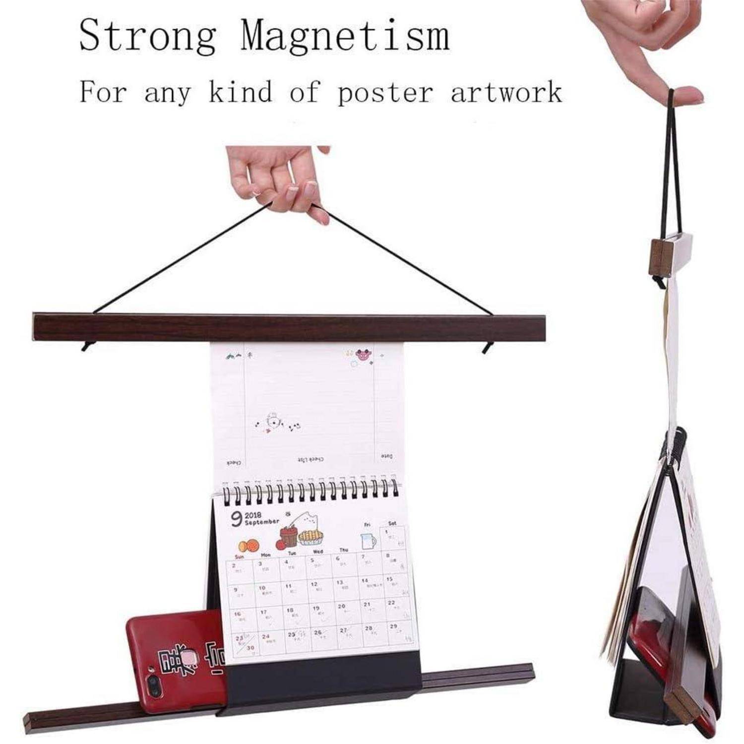 Starker Magnetismus für jede Art von Posterkunst.' Das Bild zeigt einen magnetischen Posterhalter, der verschiedene Arten von Kunstwerken und einen Kalender trägt.