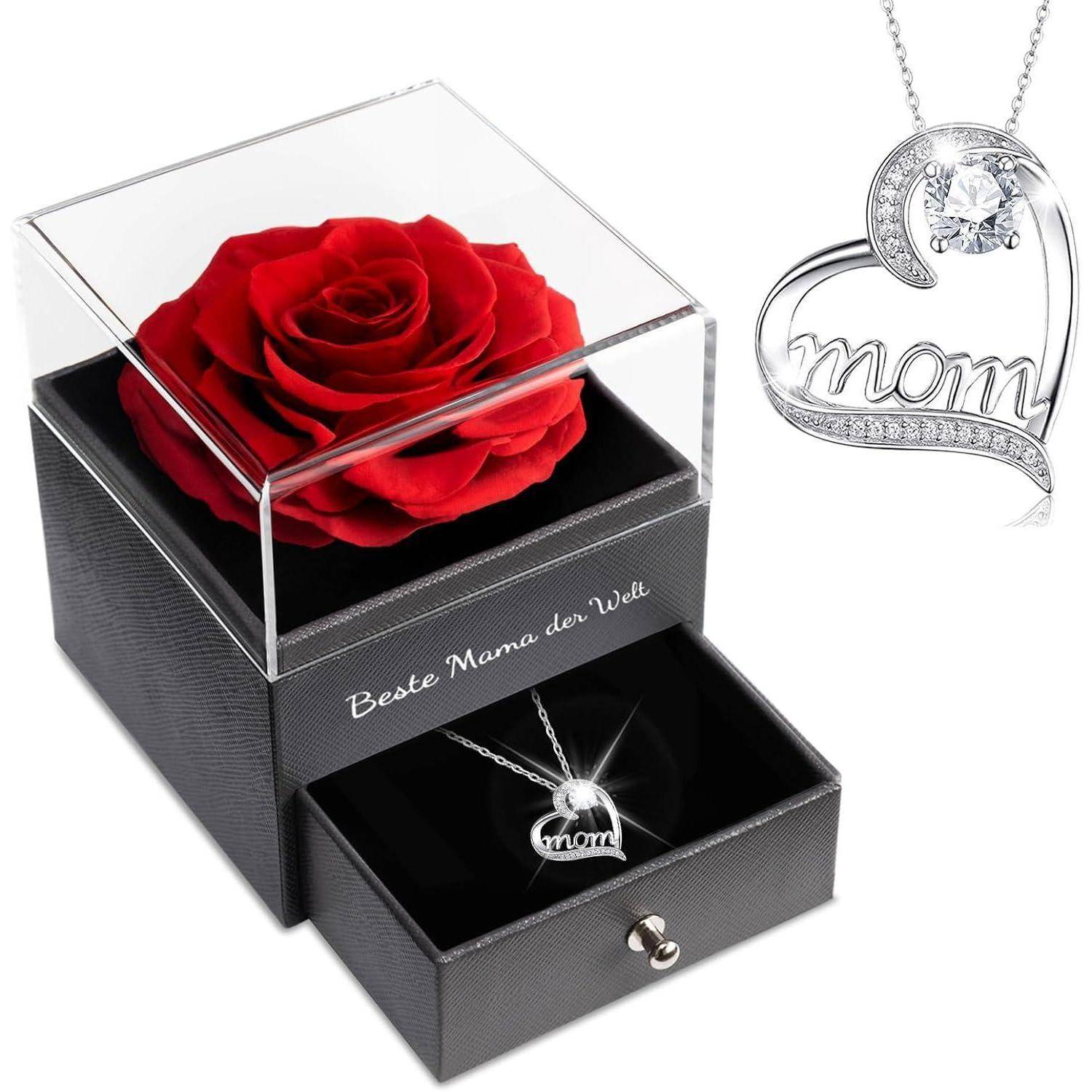 Eine rote Rose in einer durchsichtigen Box und eine herzförmige „Mama