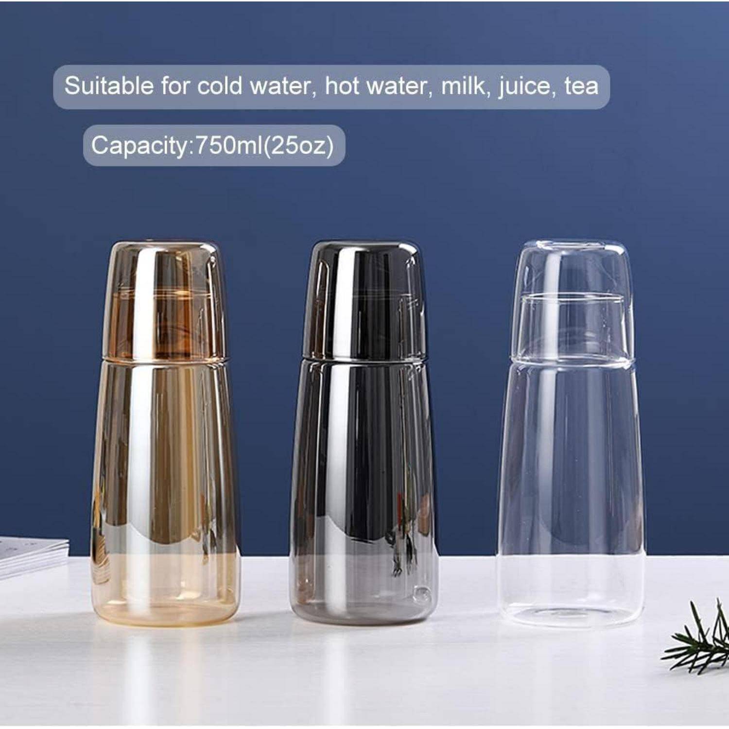 Drei 750ml Flaschen für kalte oder heiße Getränke, einschließlich Wasser, Milch, Saft und Tee, in Gold, Schwarz und Transparent, auf einem Tisch.