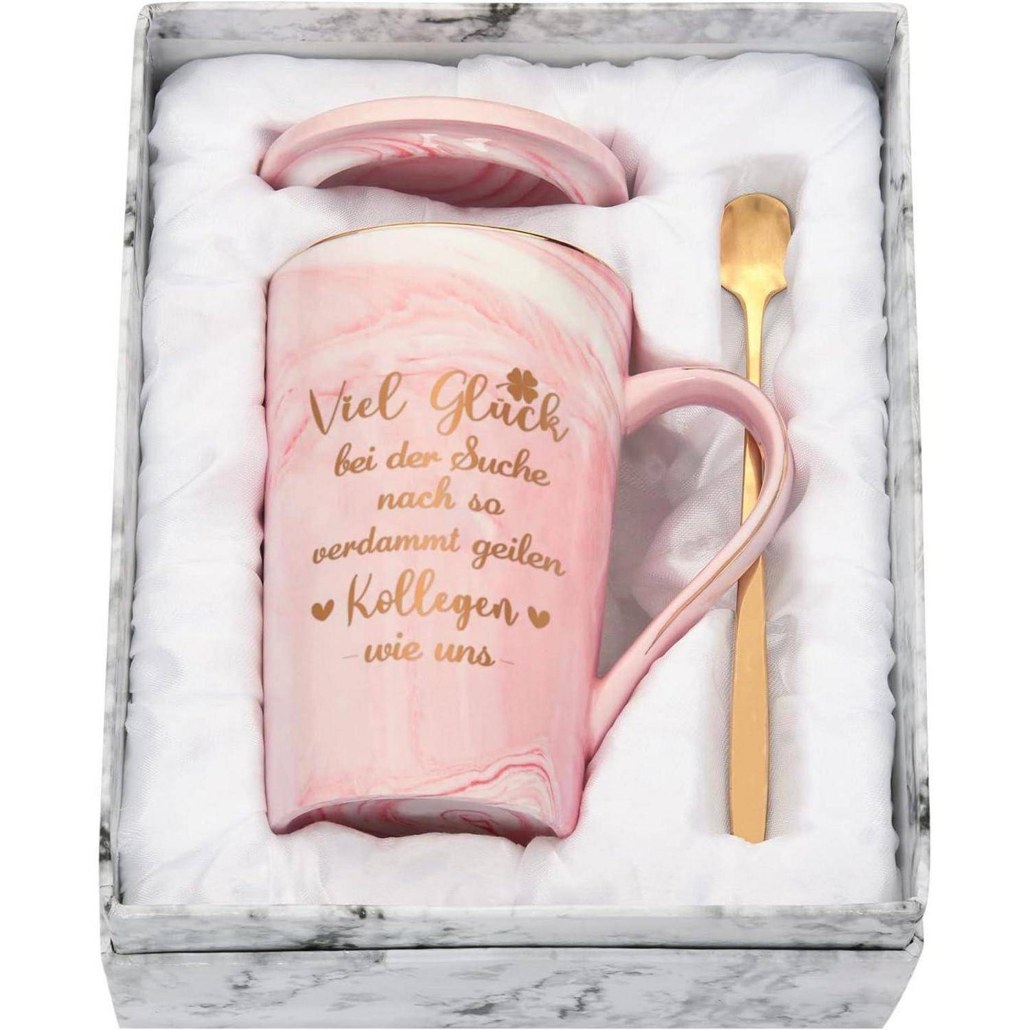 Eine rosa Tasse mit deutschem Text, der in etwa bedeutet 