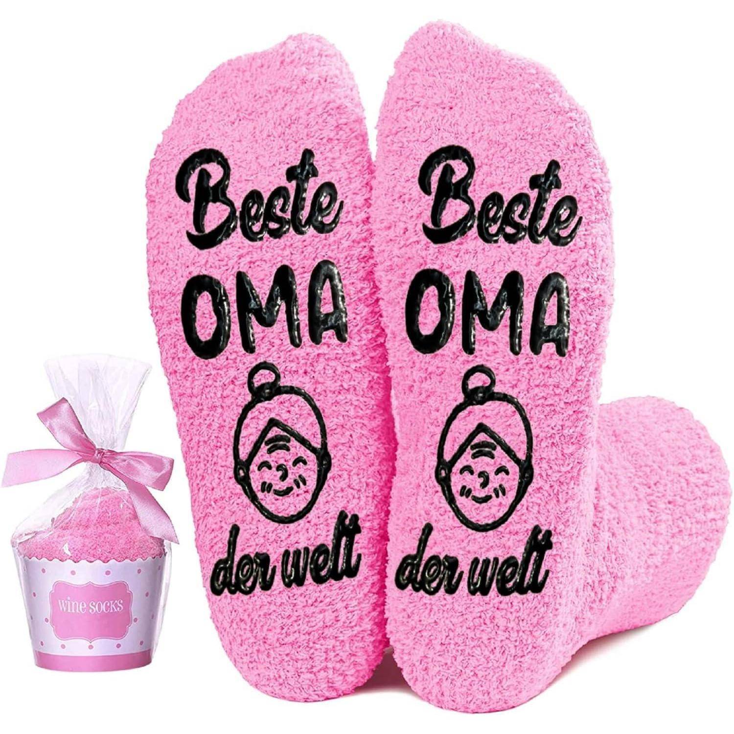Rosa flauschige Socken mit der Aufschrift 