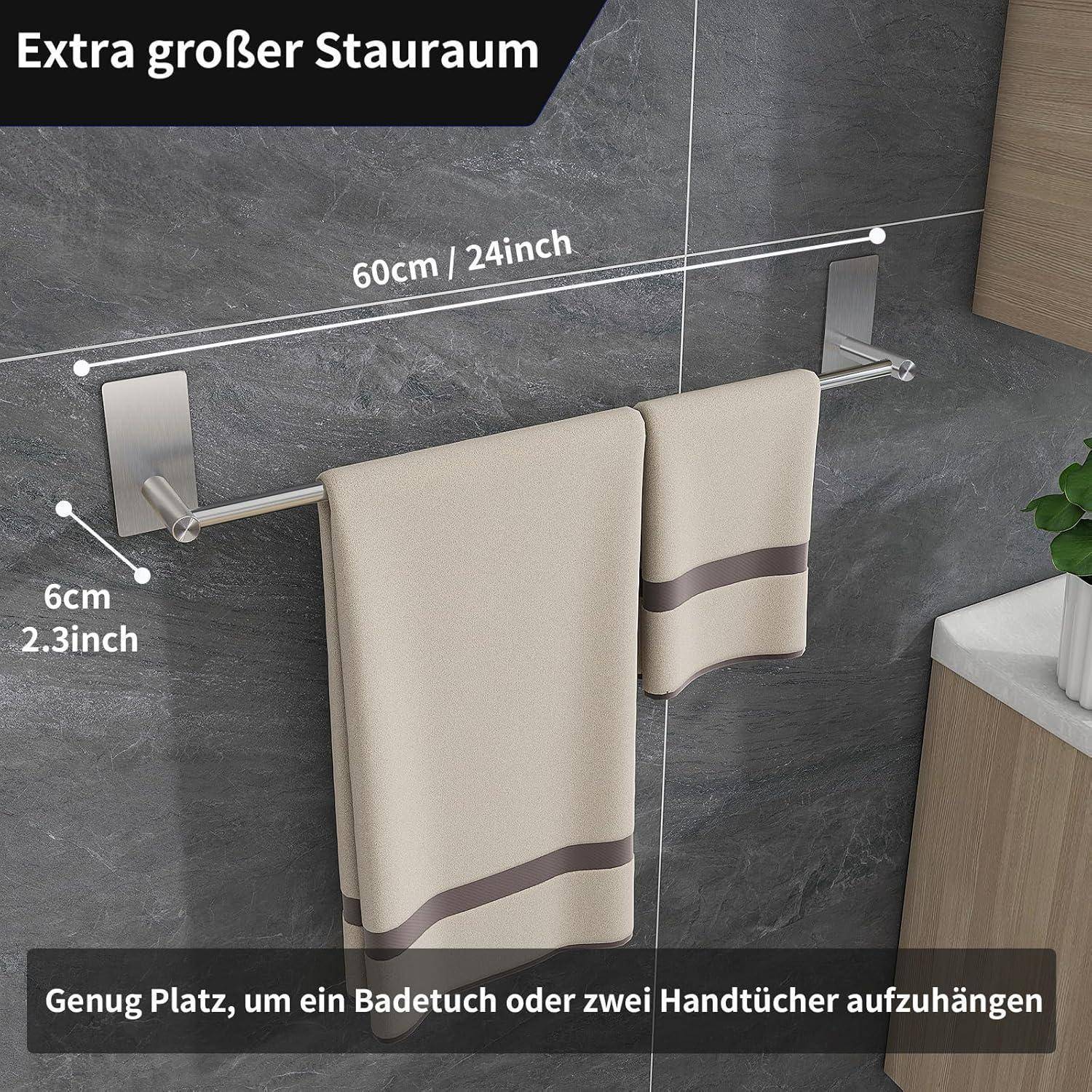 Handtuchhalter an einer Wand montiert, zwei Handtücher tragend, mit Maßangabe: '60cm/24inch'. Text lautet: 'Extra großer Stauraum' und 'Genug Platz, um ein Badetuch oder zwei Handtücher aufzuhängen'.
