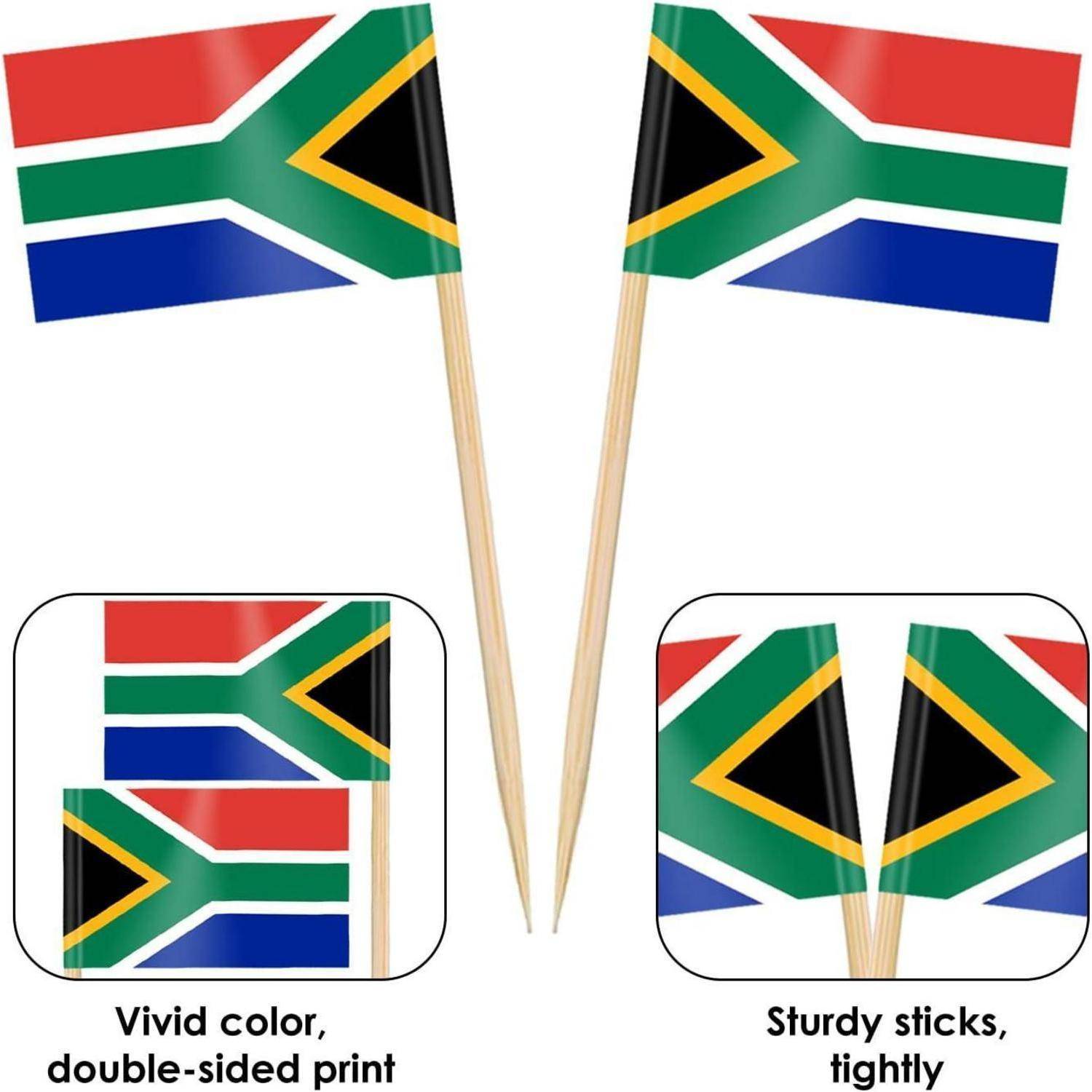 Zwei Zahnstocher-große Flaggen mit dem Design der südafrikanischen Flagge. Einblendungen heben lebendige Farben hervor, beidseitiger Druck und stabile Stäbchen.