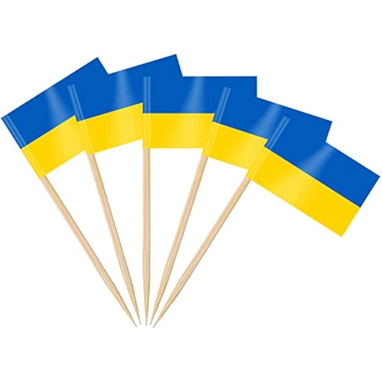 Fünf kleine Zahnstocherfähnchen der Ukraine mit blauen und gelben Horizontalstreifen.
