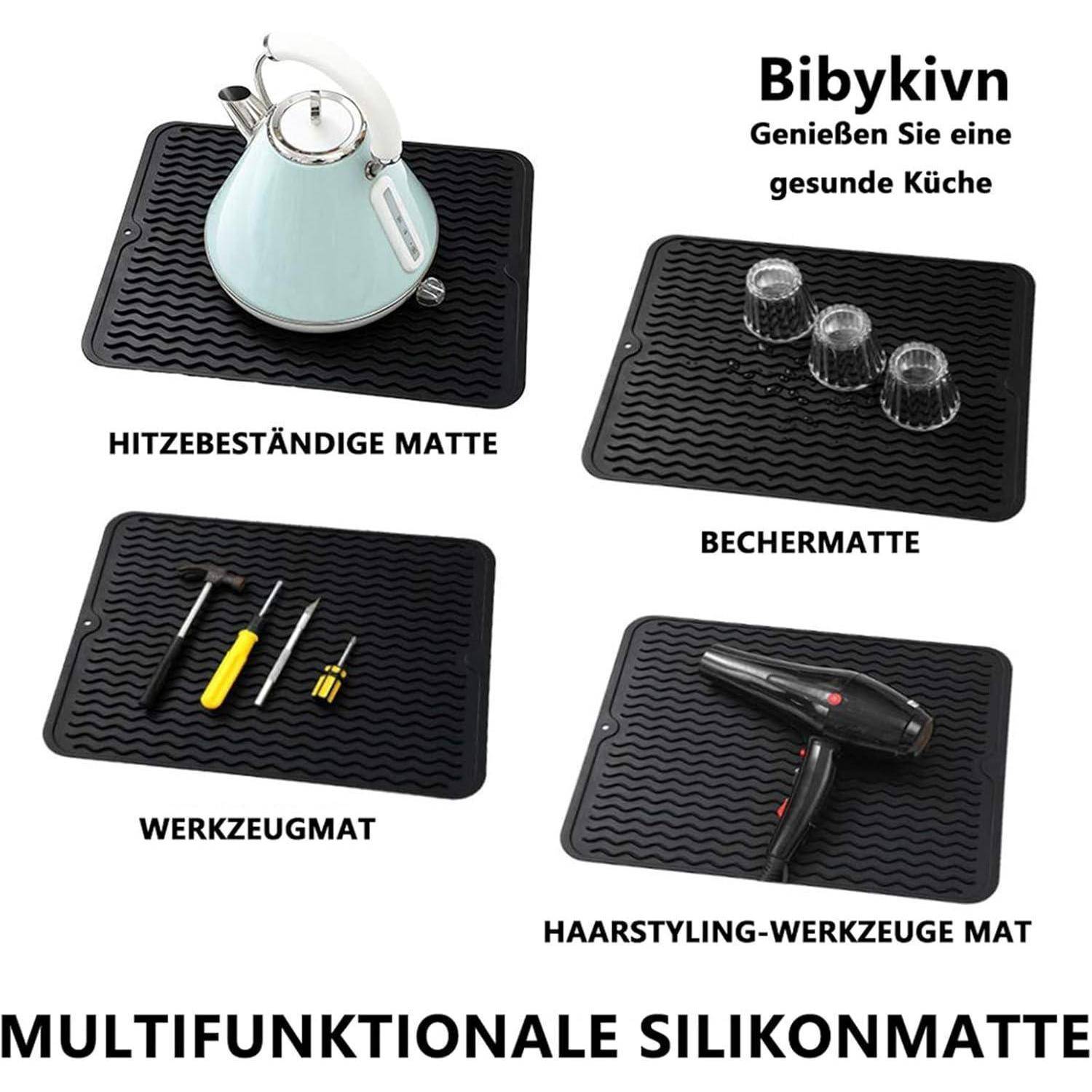 Multifunktionale Silikonmatten mit verschiedenen Anwendungsmöglichkeiten: hitzebeständig für Wasserkocher, Unterlage für Tassen, Werkzeugunterlage für Schraubendreher und Unterlage für Haarstyling-Werkzeuge.