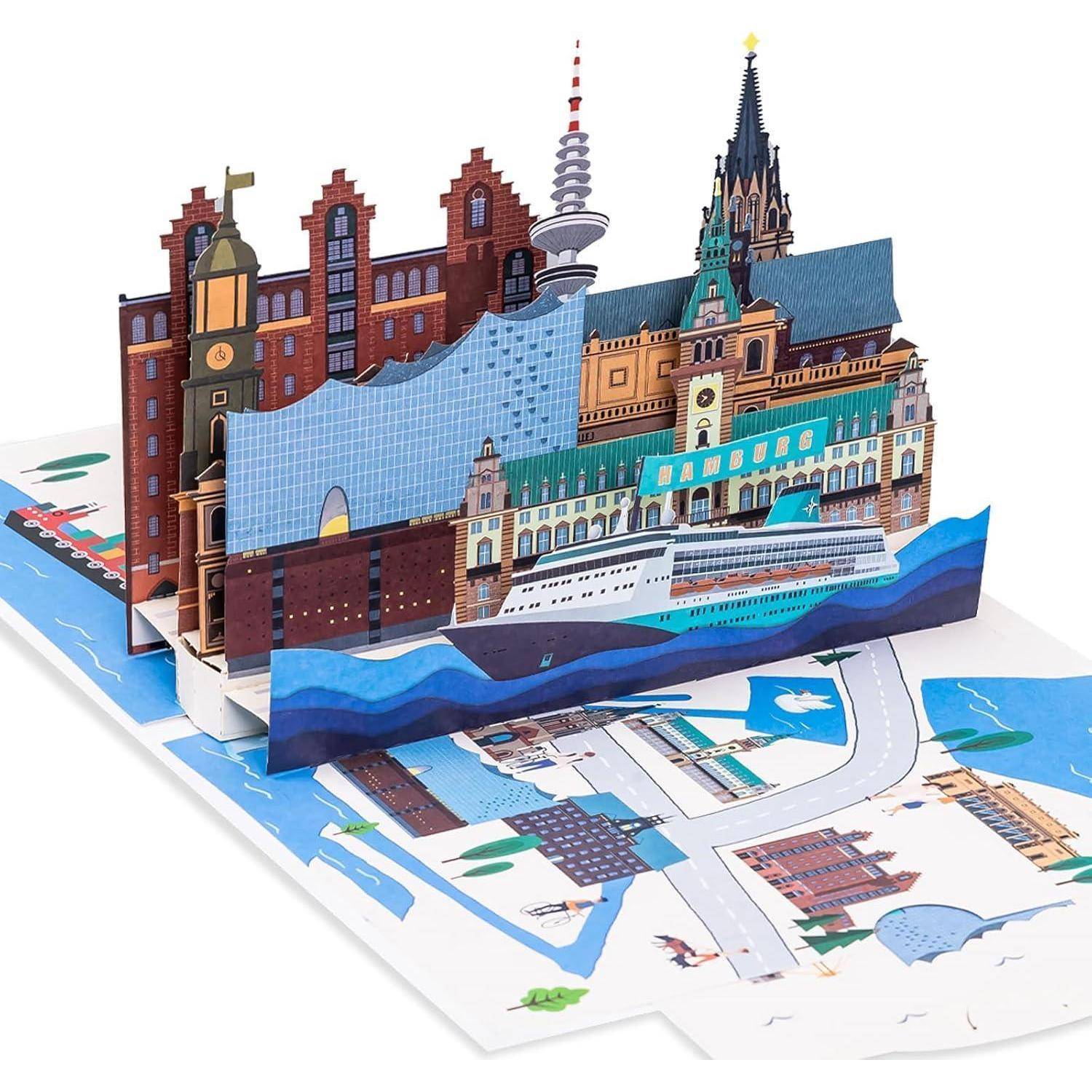 Pop-up-Karte mit einer 3D-Skyline einer Stadt mit markanten Gebäuden und einem Schiff vor einem stilisierten Kartenuntergrund.