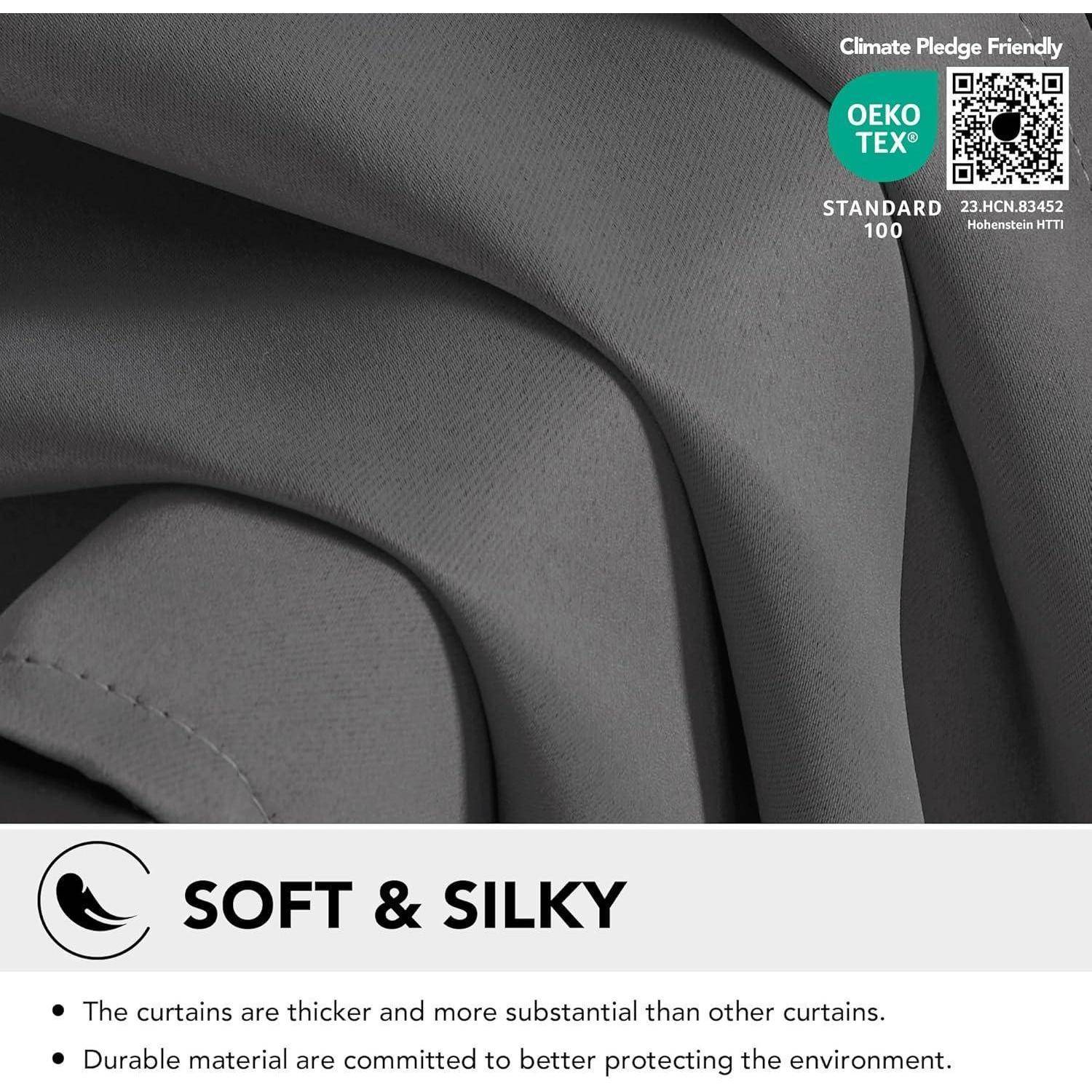 Nahaufnahme von 'Soft & Silky' Stoff, graue Nuance. Labels: 'OEKO-TEX', 'Climate Pledge Friendly'. Text: 'Strapazierfähiges Material schützt besser.