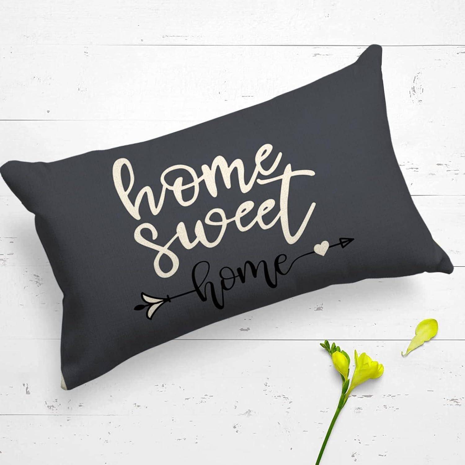 Ein schwarzes Kissen mit den Worten „home sweet home