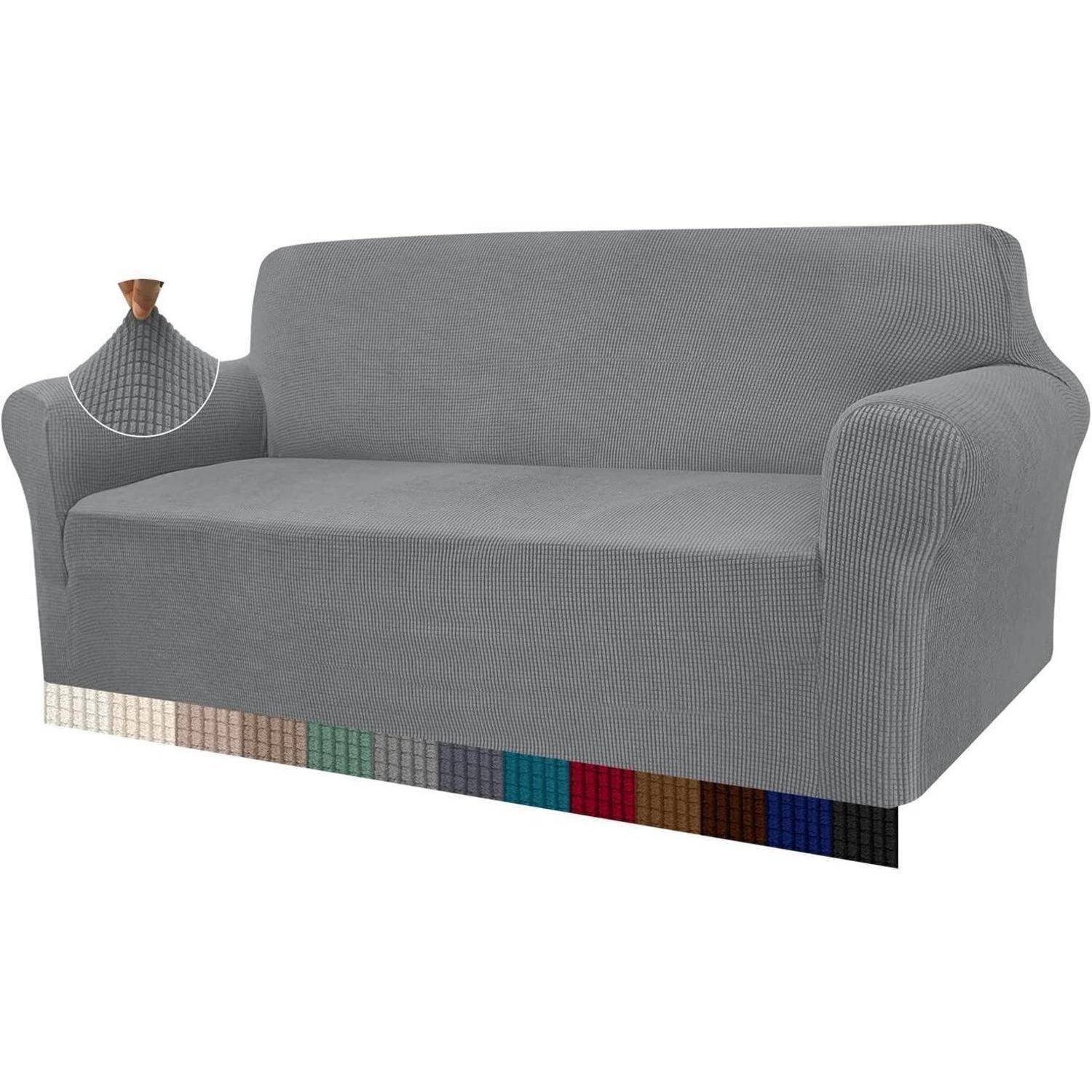 Ein grauer Sofa mit einem dehnbaren Stoffbezug; Farbmuster darunter zeigen Stoffoptionen in Beige, Braun, Blau, Grün und Rot.