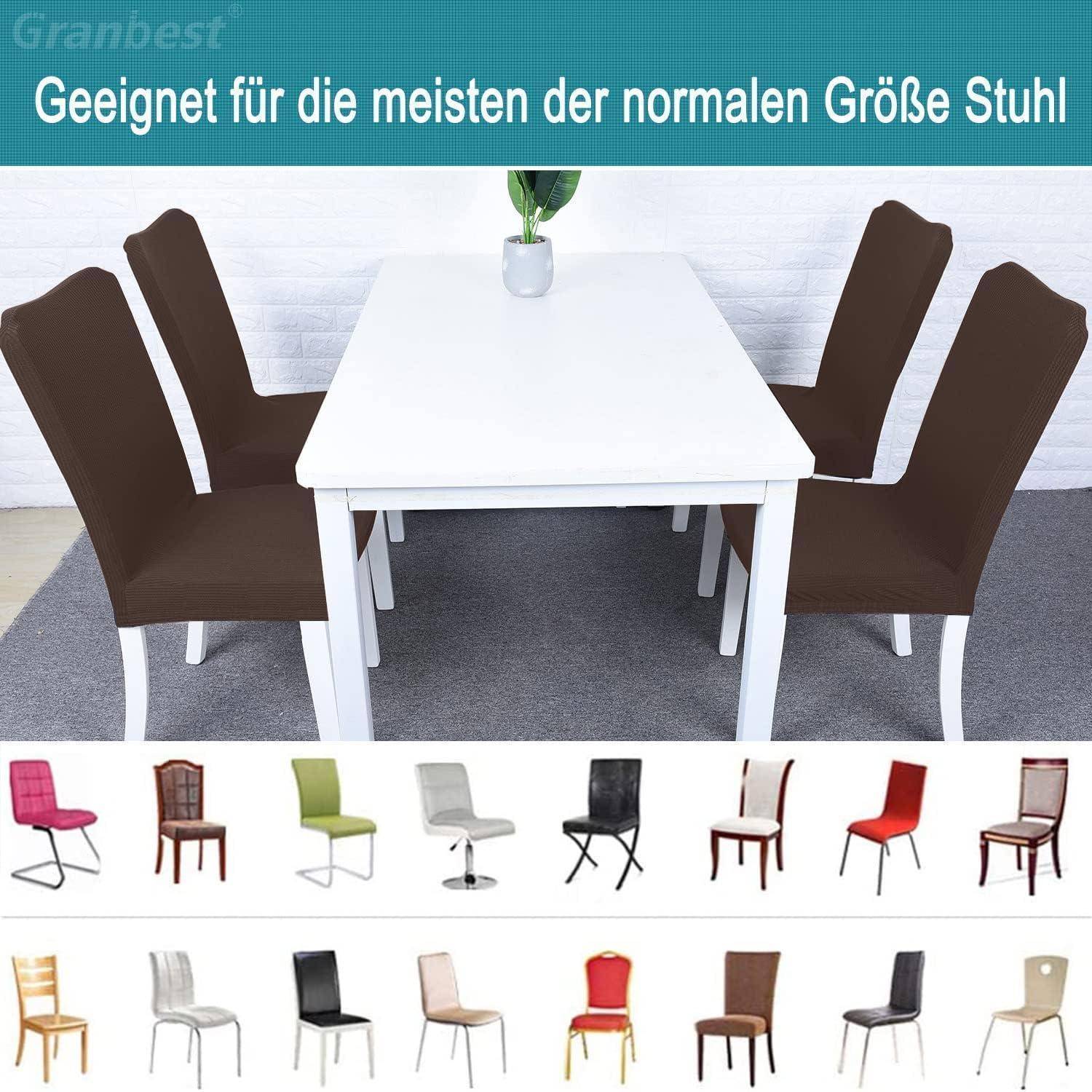 Auswahl von Esszimmerstühlen mit braunen Schonbezügen an einem weißen Tisch.
